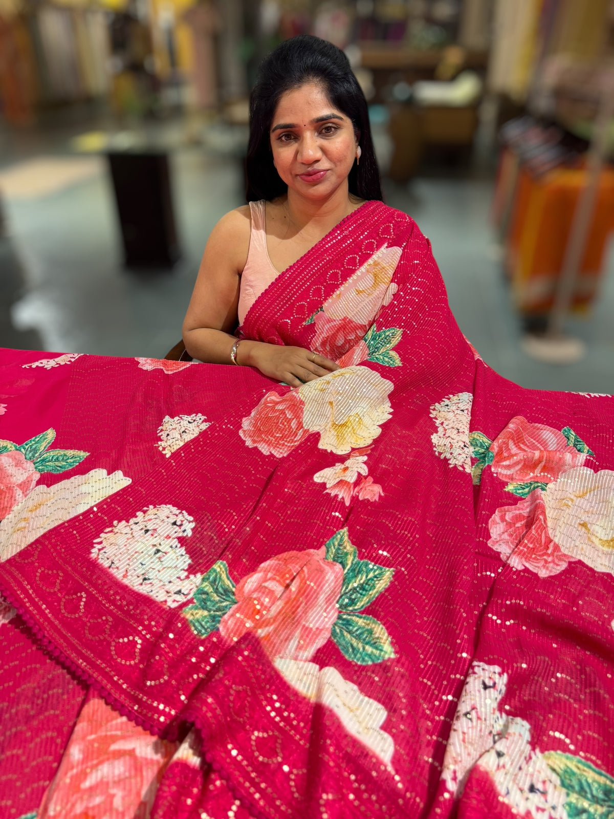 Reddish Pink georgette sequence saree with statement floral print