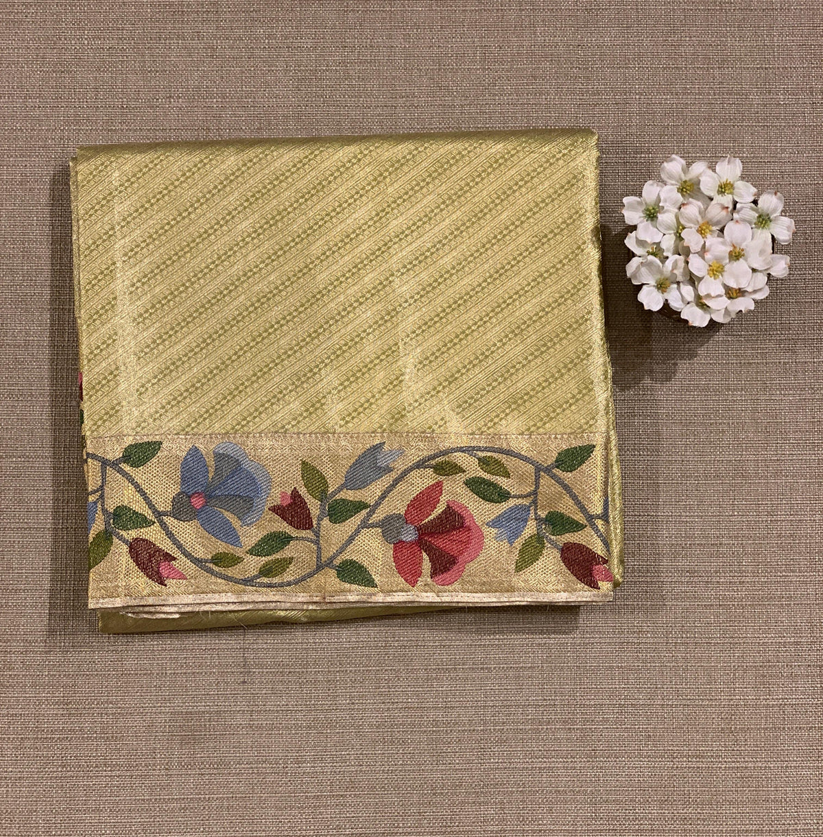 Apple Green Kanchi Tissue Brocade Saree With jamdani inspired embroidery.