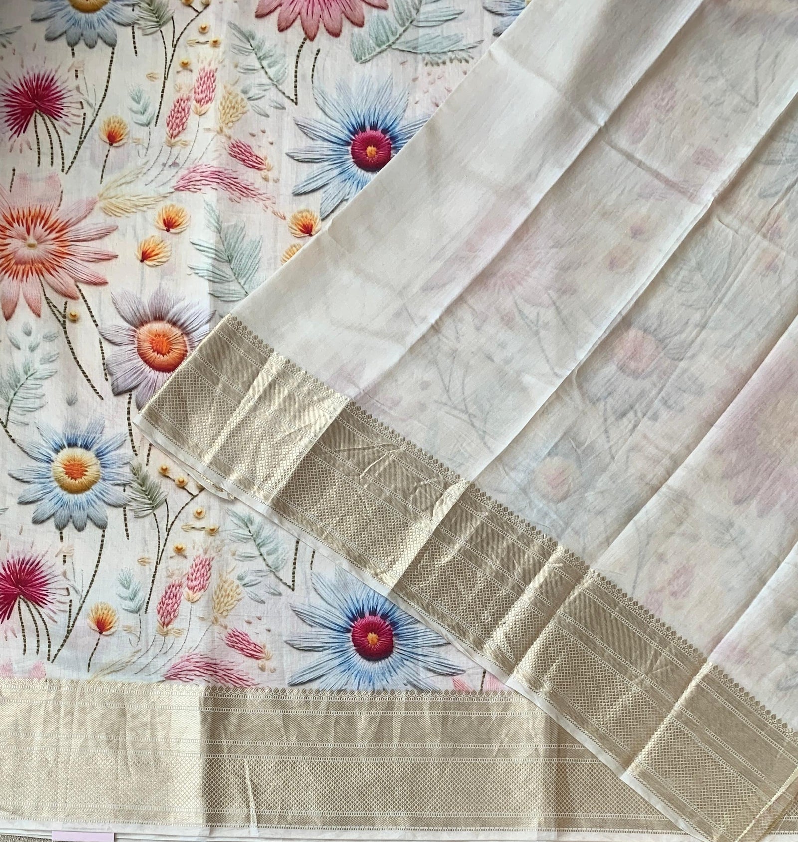 Ivory Pure Handloom Chiniya Silk Saree with stunning Floral Print and zari borders