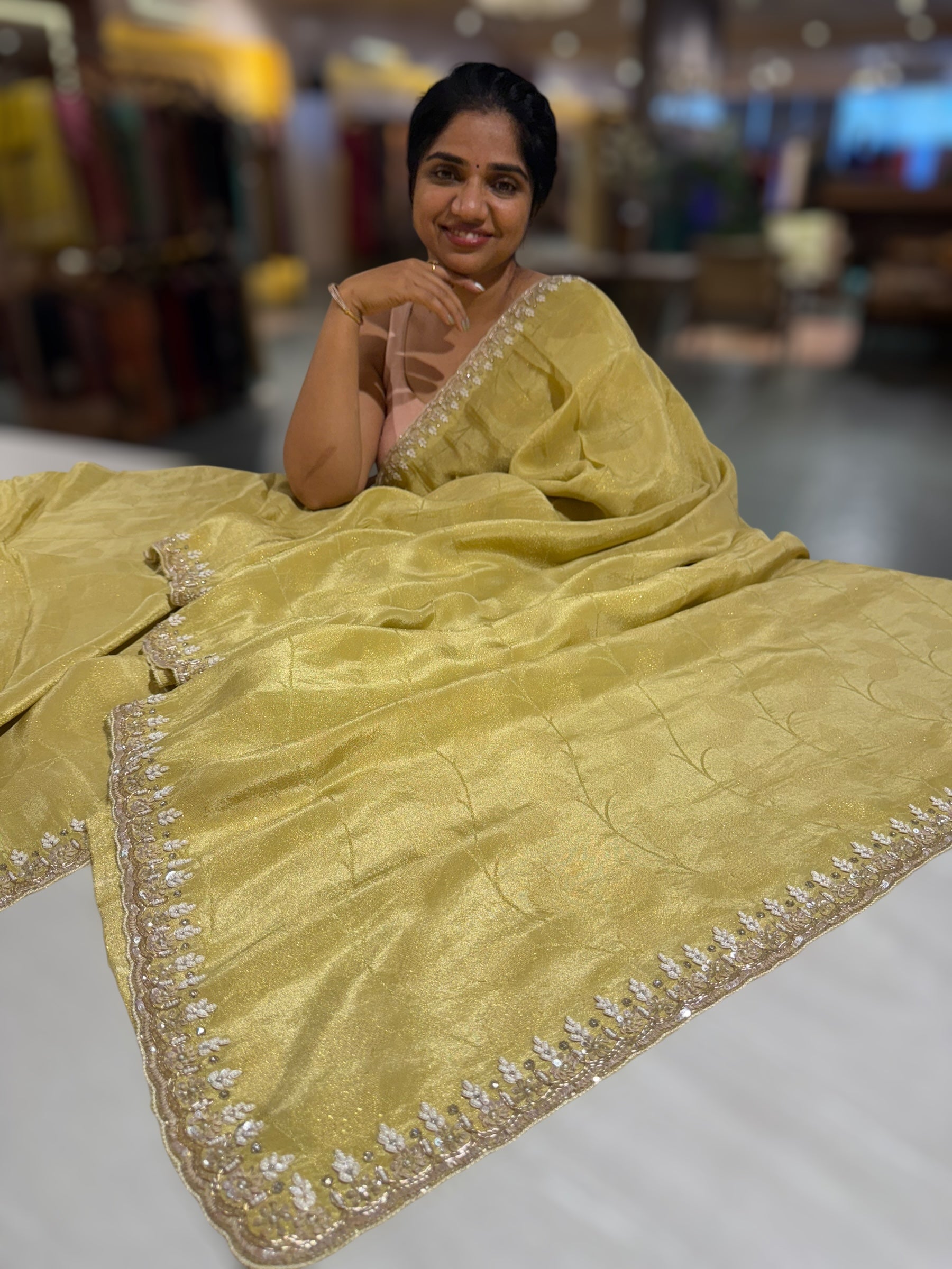 Pastel Yellow Tissue Gorgette Saree With Hanwork Border and Blouse.