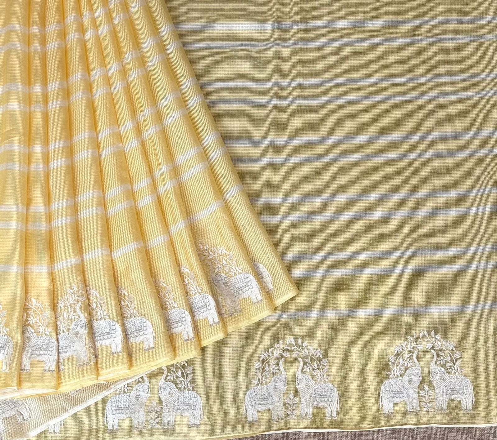 Pastel Yellow Designer Silk kota saree with elephant embroidered border