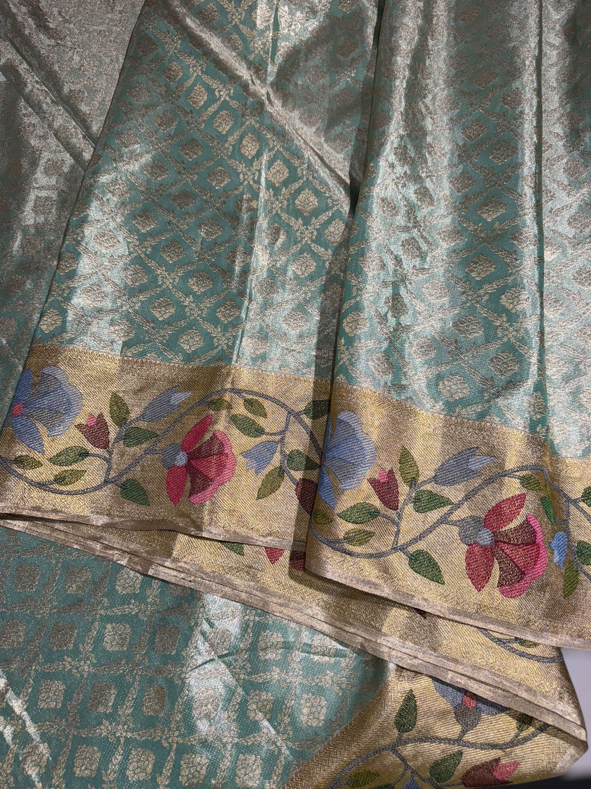 Sea Green Kanchi Tissue Brocade Saree With jamdani inspired embroidery.