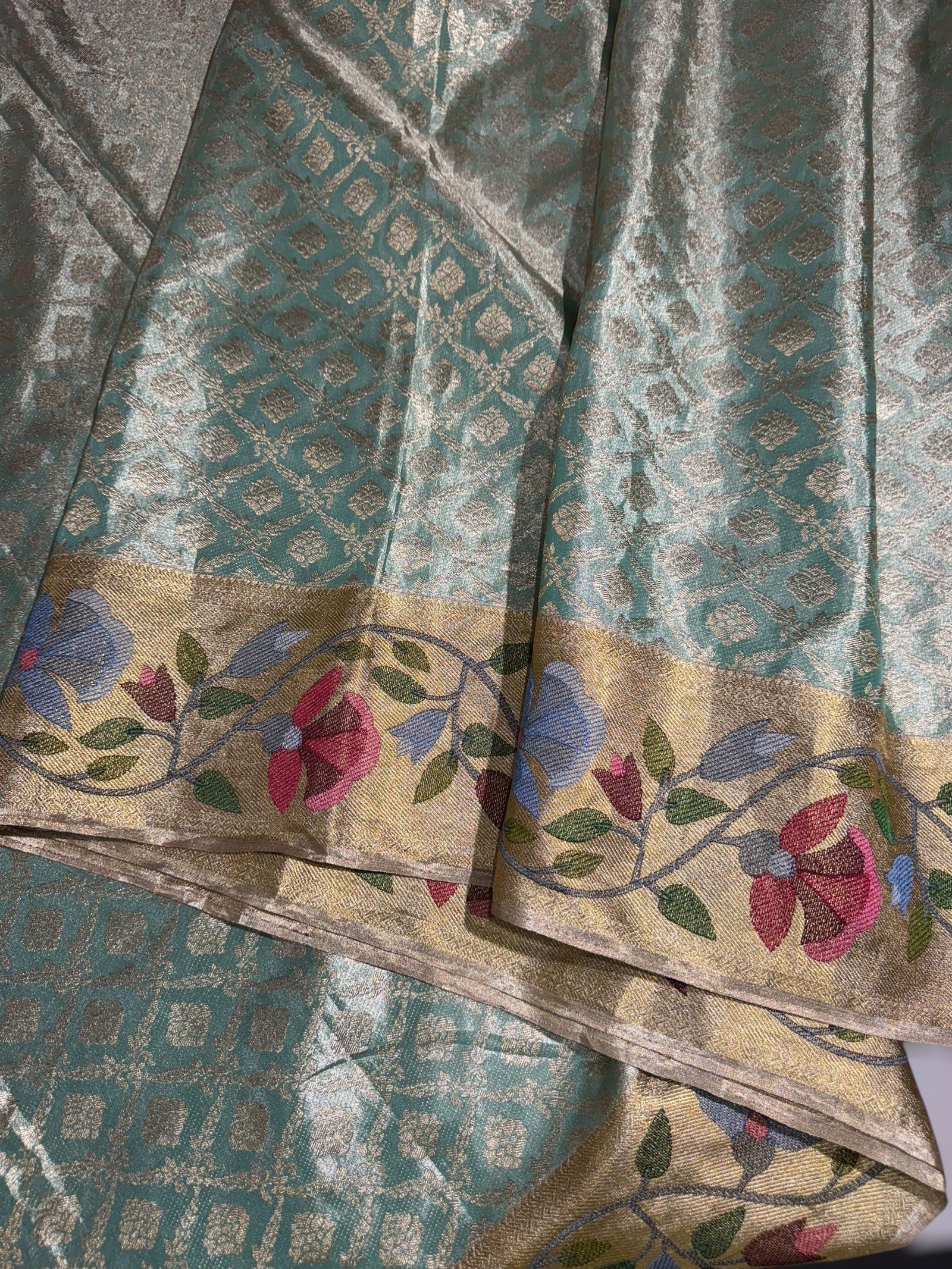 Sea Green Kanchi Tissue Brocade Saree With jamdani inspired embroidery.