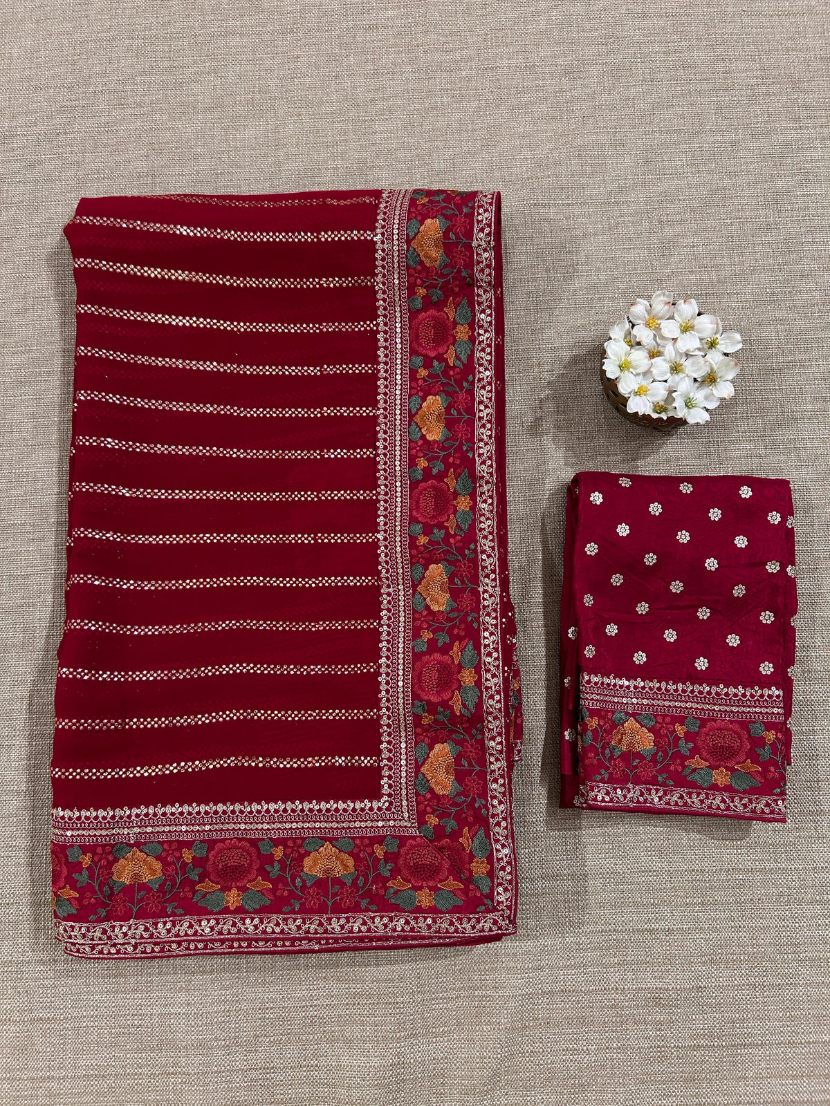 Red Georgette Saree with stick on badla with Sabyasachi borders and blouse