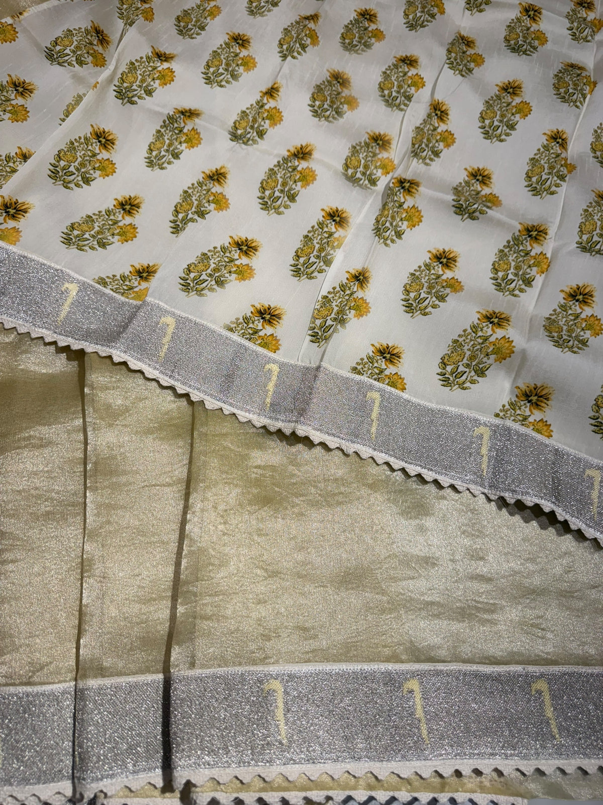 Pastel yellow Tissue Saree with pythani tissue embroidered border