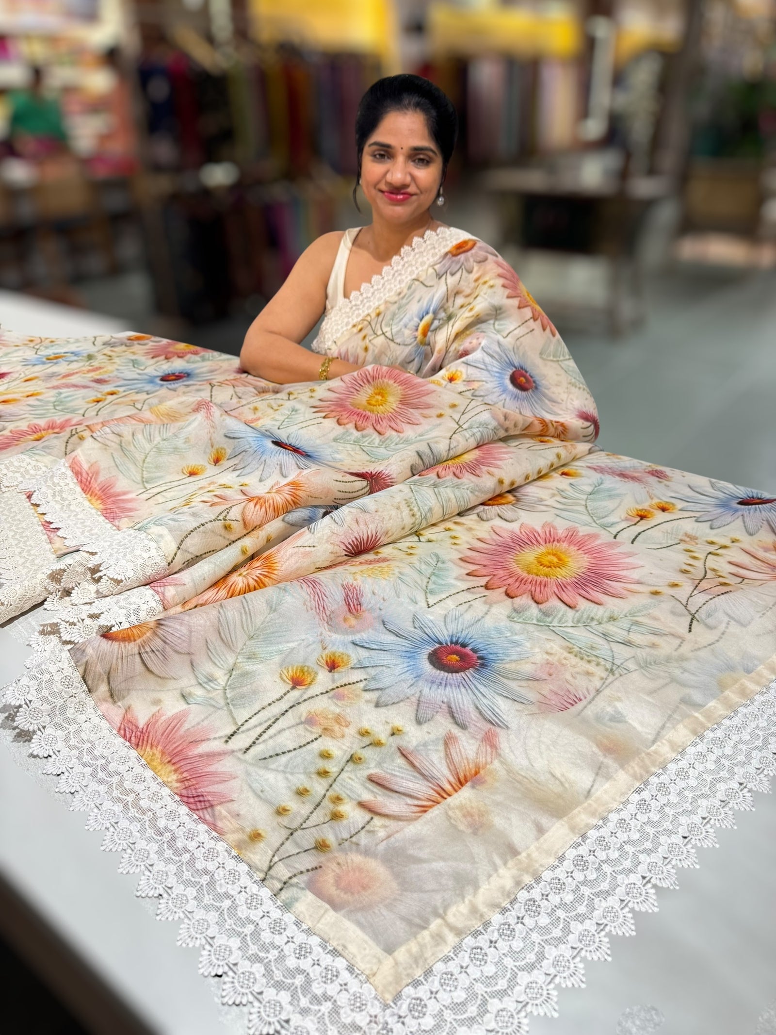 Ivory Organza 3D floral Printed Saree hemlined with crotia lace