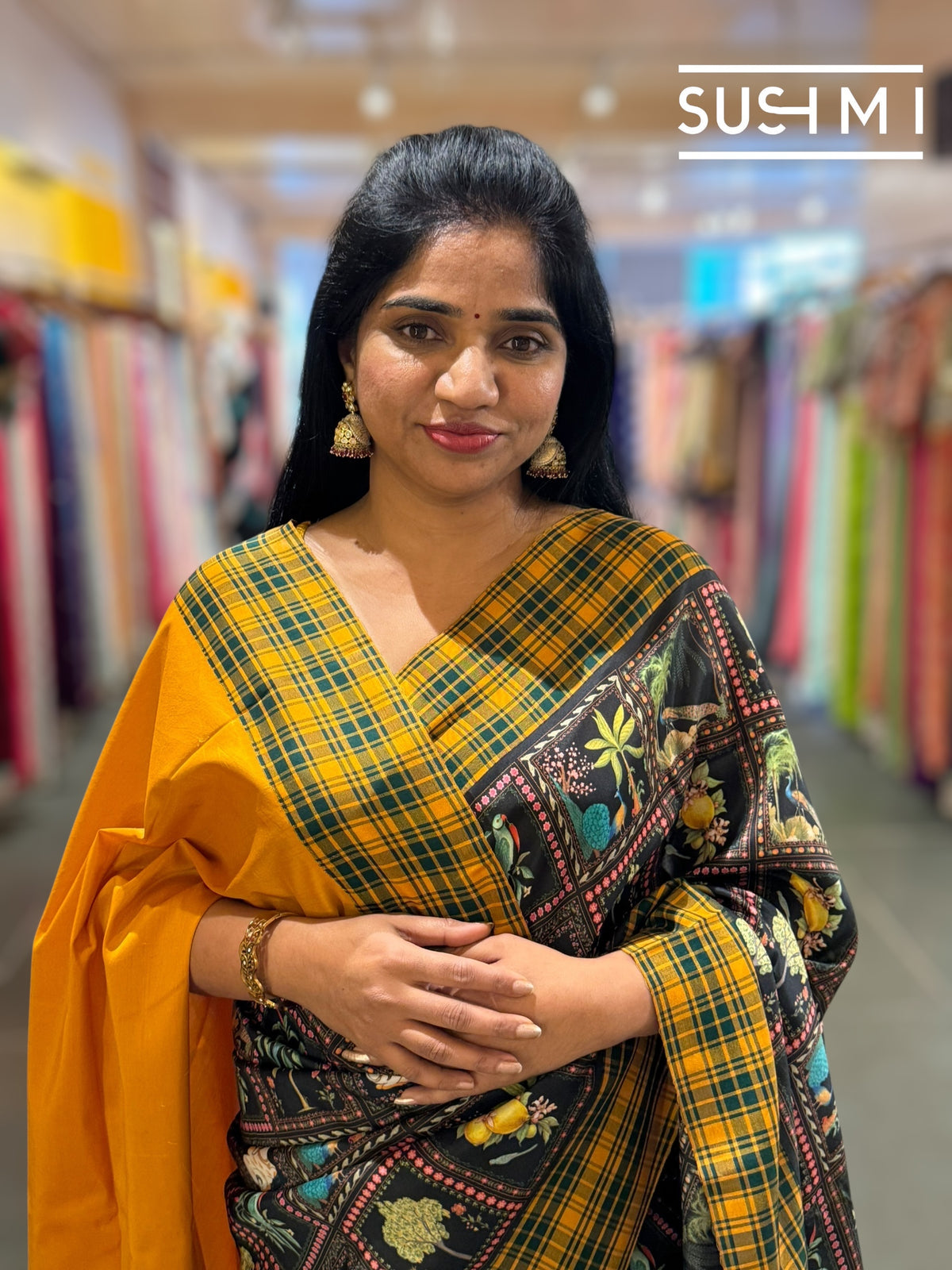 Black printed soft silk saree with burberry checks border : D62F033