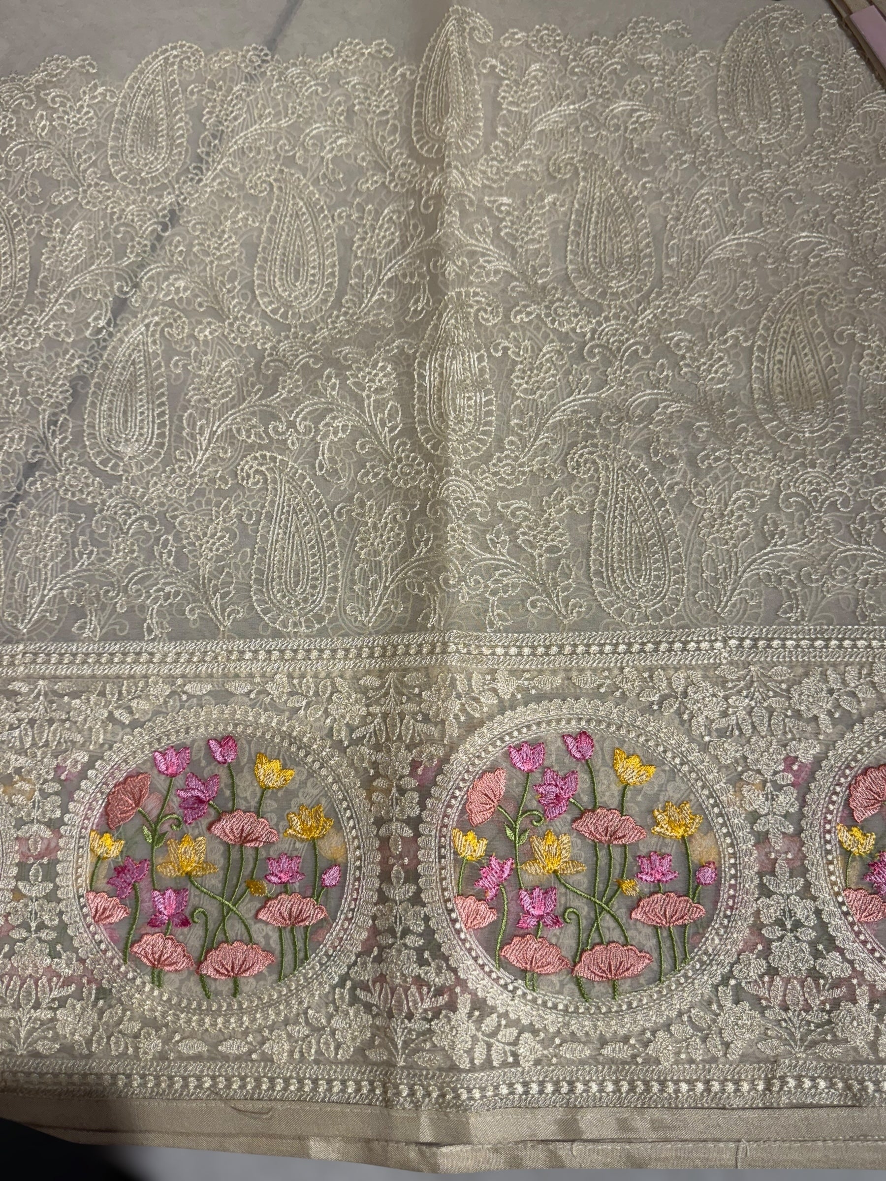 Ivory Organza Saree with allover Chikankari Embroidery and pichwai border