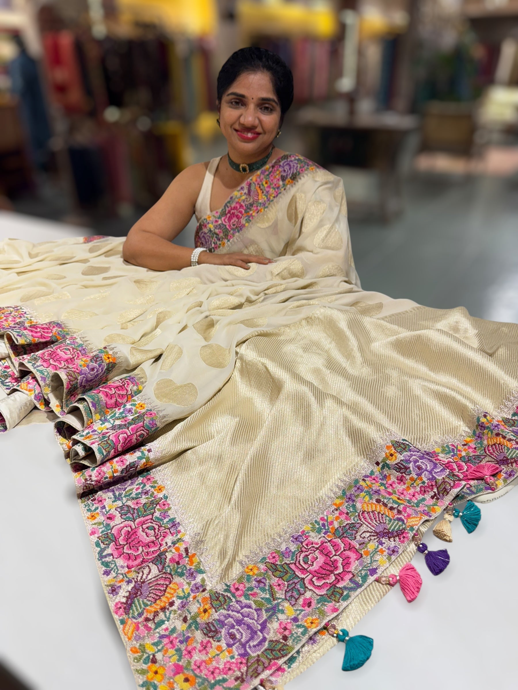 Halfwhite khaddi Chiffon Saree with allover zari weaving polka dots & Petite Point border