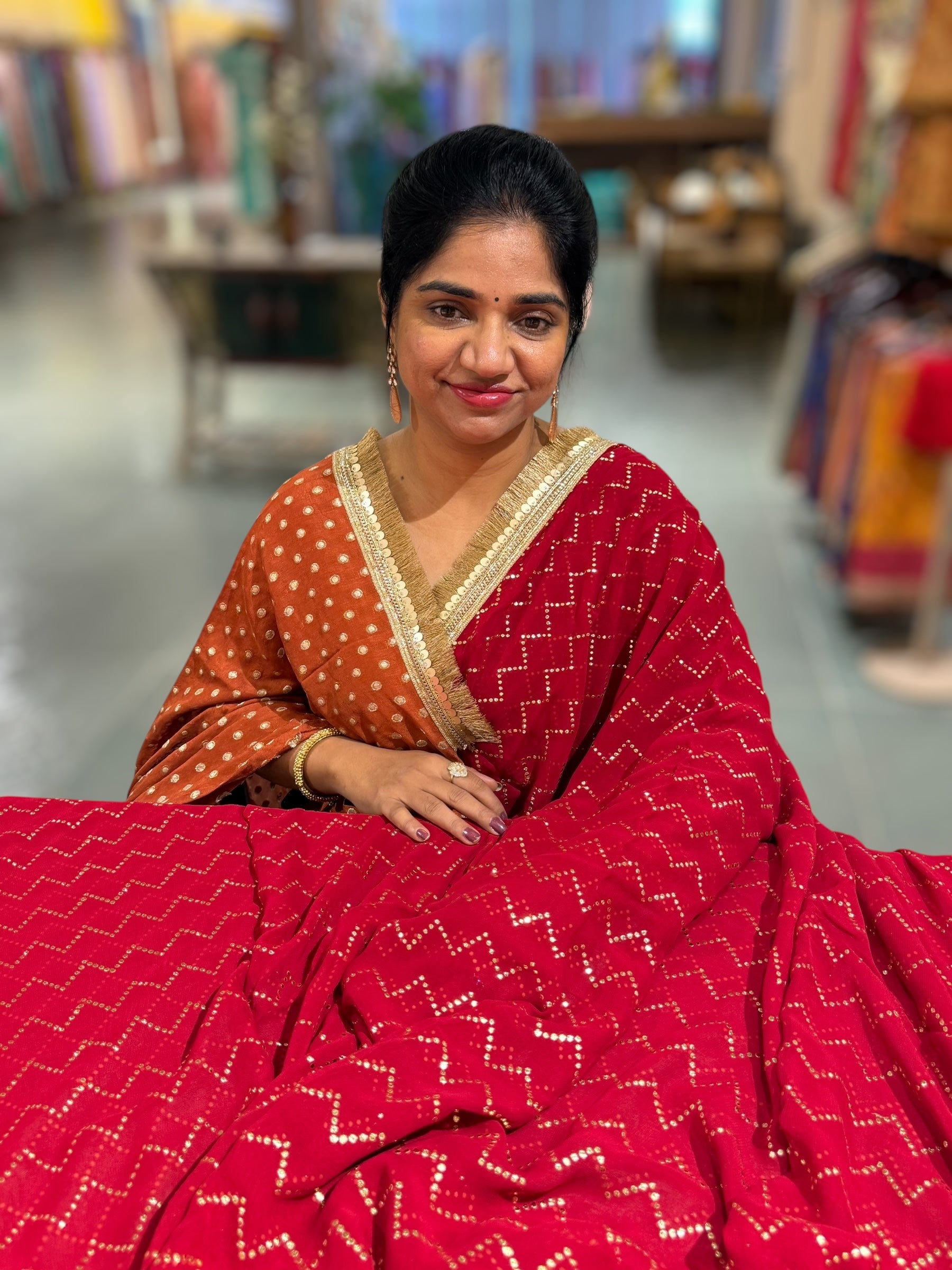 Dark Red Georgette Saree with stick on Badla in zigzag pattern