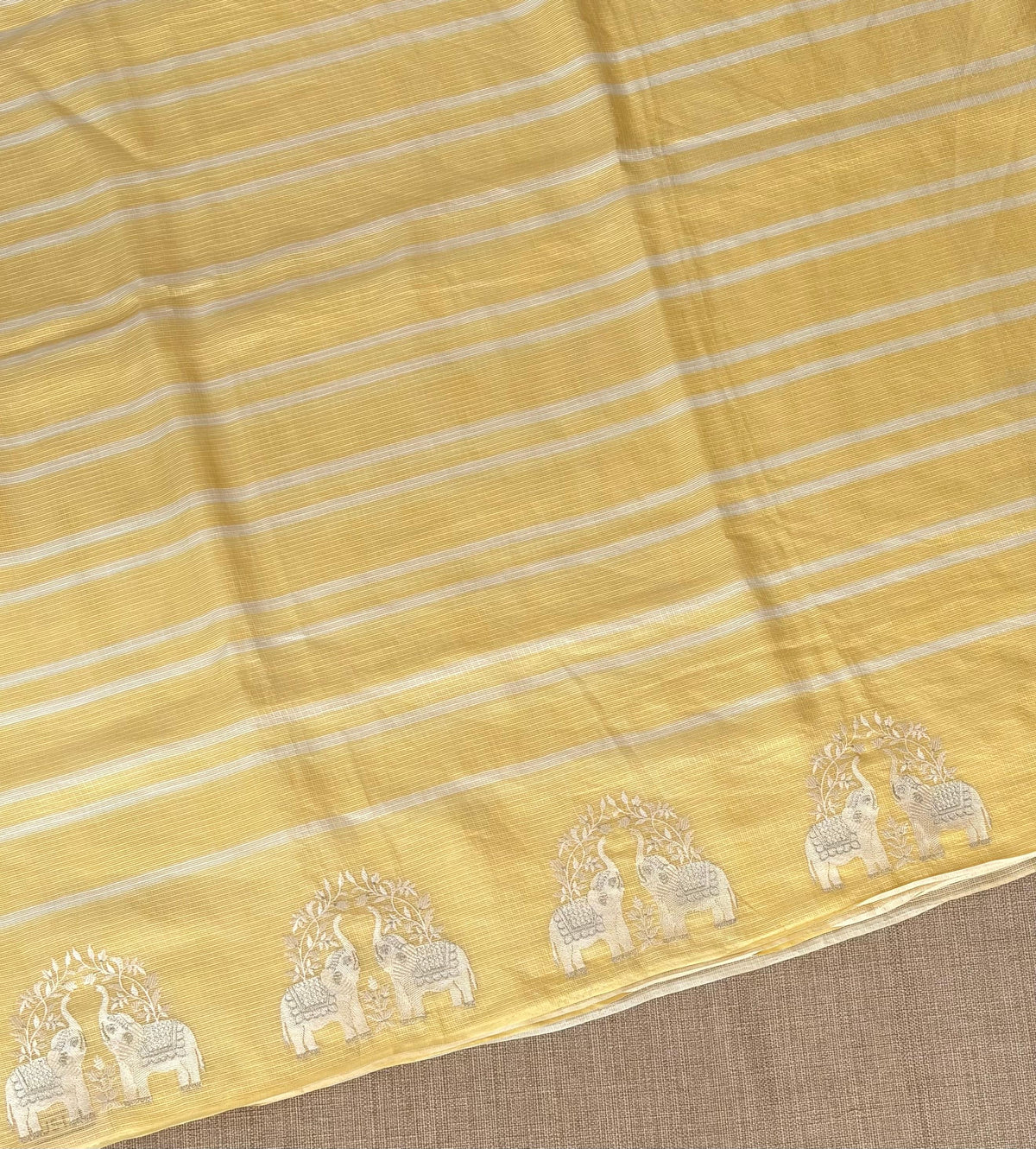 Pastel Yellow Designer Silk kota saree with elephant embroidered border