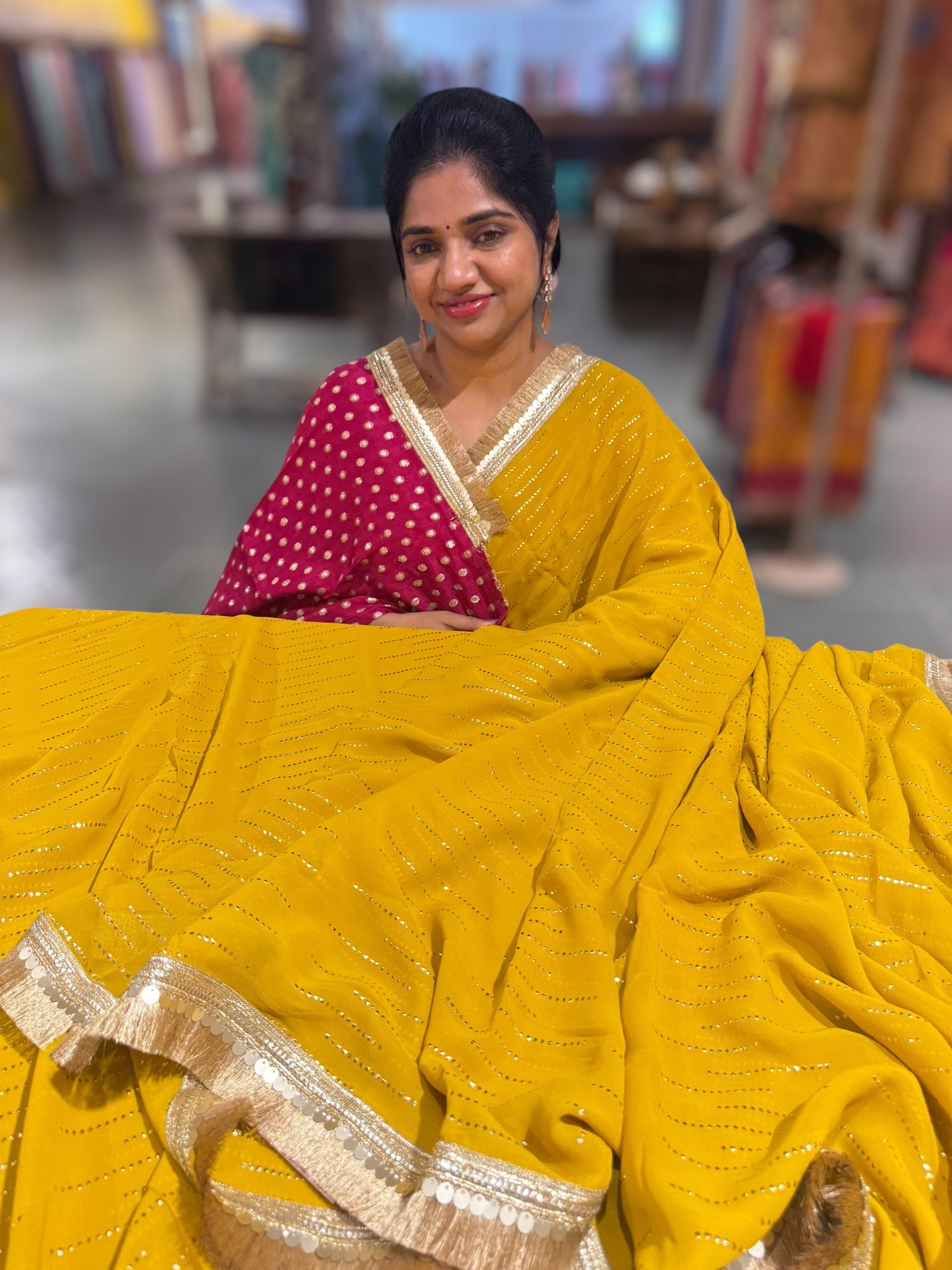 Yellow light Georgette Saree with stick on Badla in stripes pattern and kiran Lace