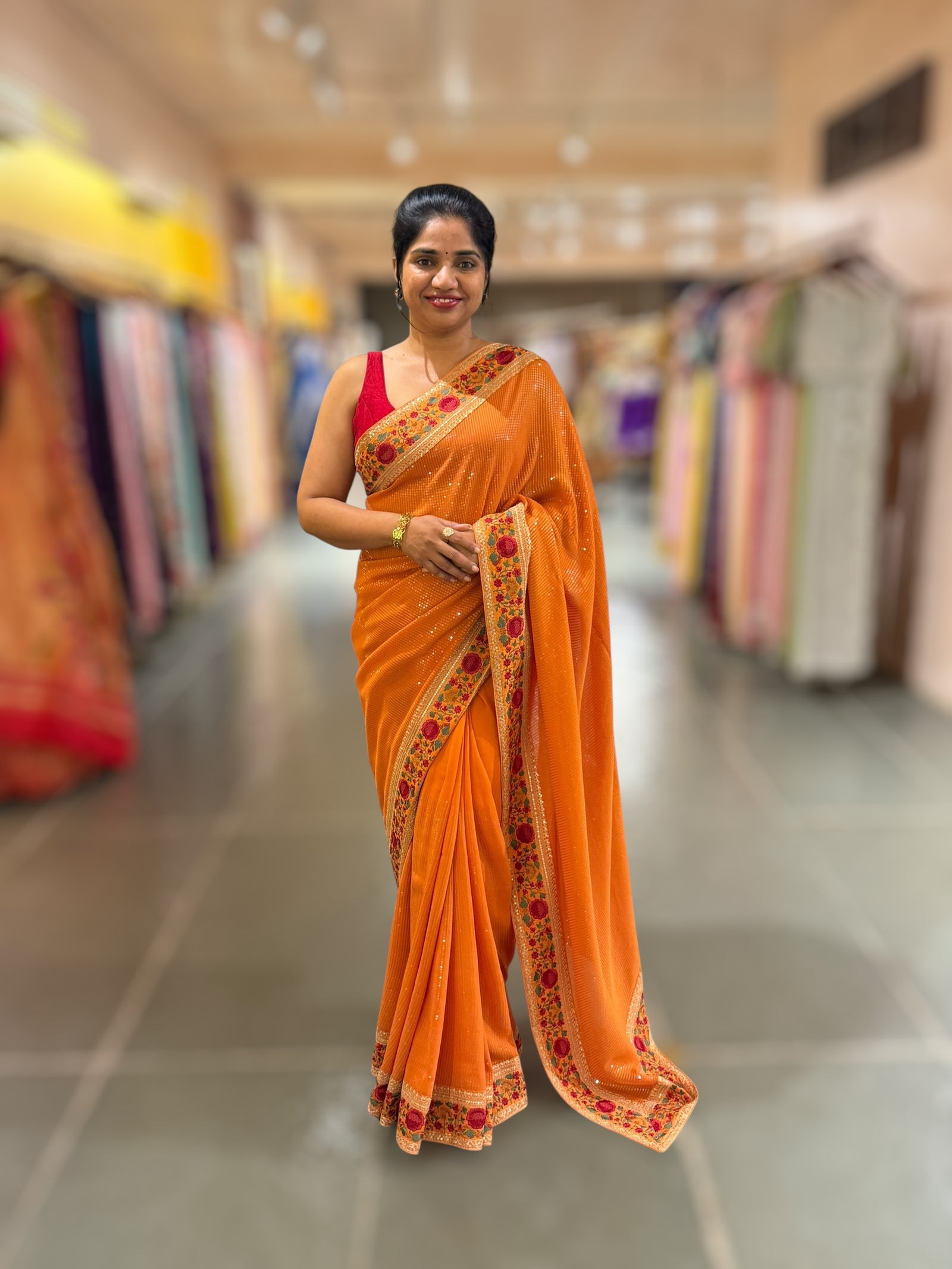 Orange Georgette sequnce Saree with Sabyasachi borders