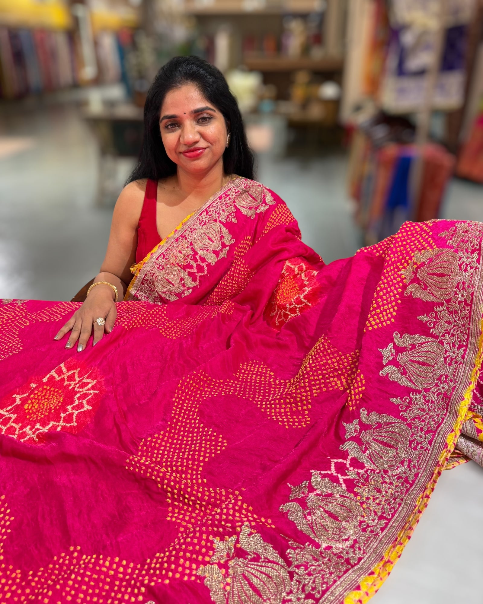 Fushcia Pink Designer Rai Bandhej Saree With Embroidered Border