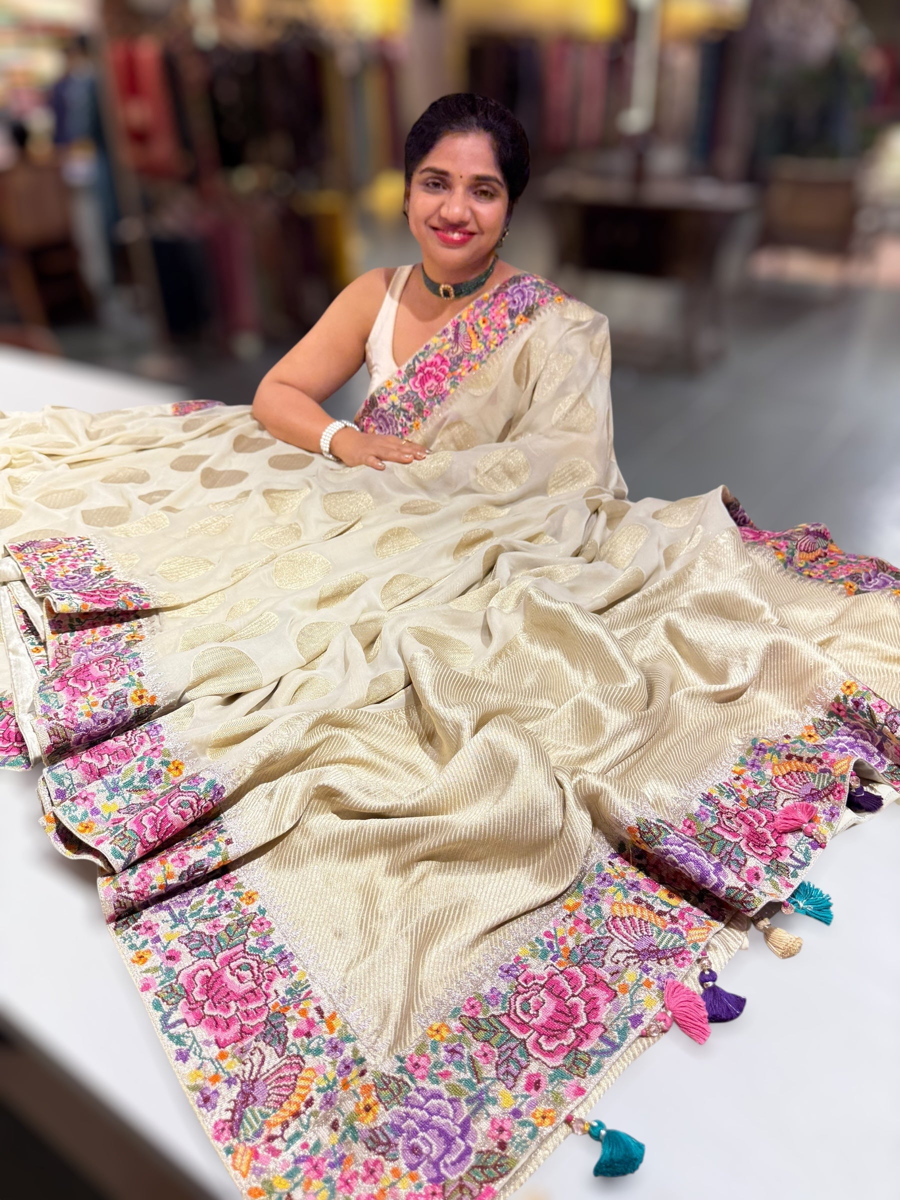 Halfwhite khaddi Chiffon Saree with allover zari weaving polka dots & Petite Point border