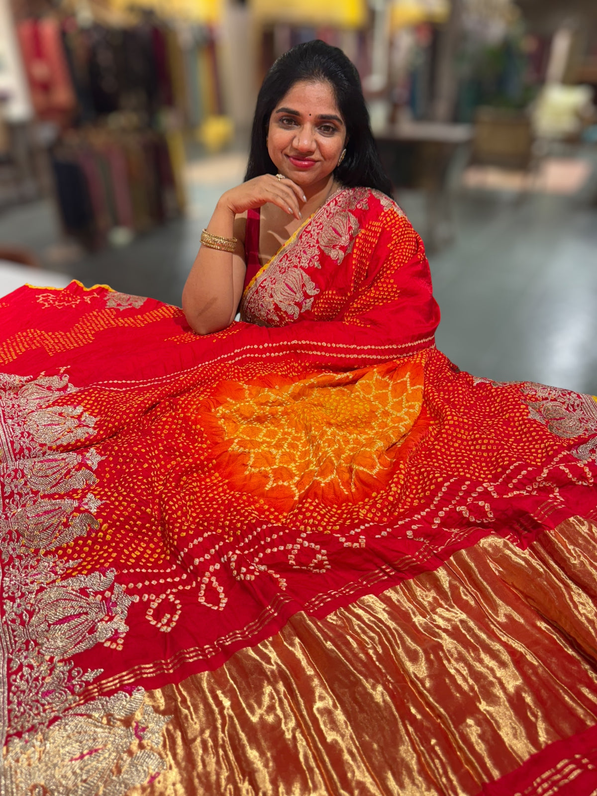 Orangish Red Designer Rai Bandhej Saree With Embroidered Border