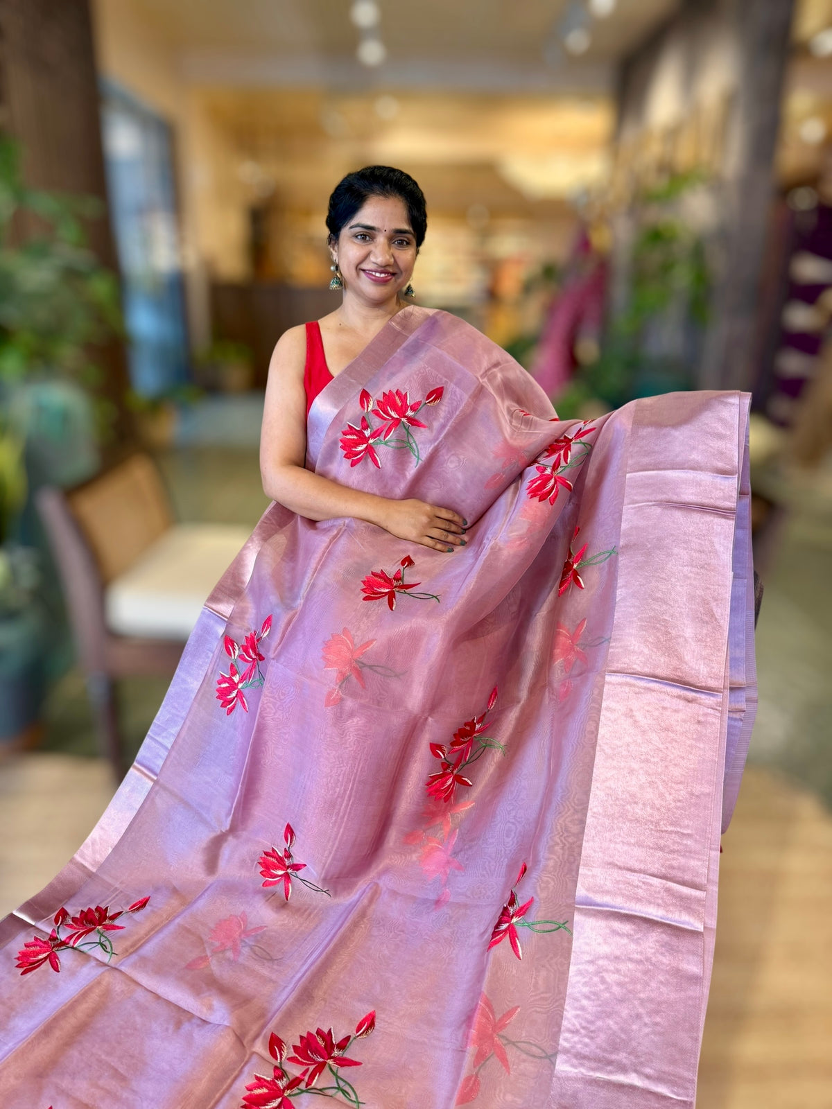 Mauve Organza Saree with Lotus flower embroidery and Satin Borders.