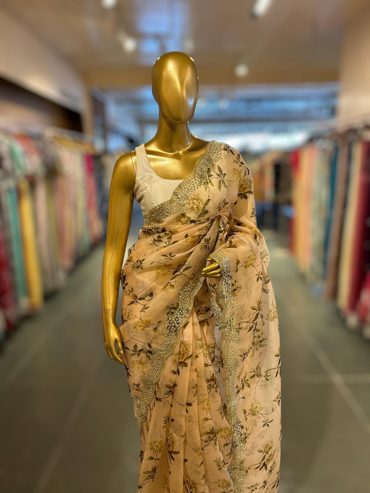 Peach Organza floral Printed Saree with mirrorwork handwork scalloped Border