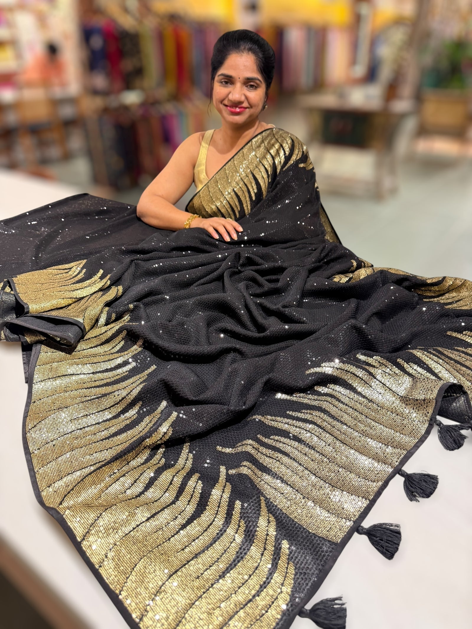 Black Georgette Saree with stunning Gold embroidered Border