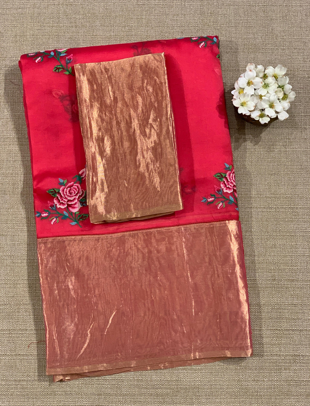Pinkish Red Organza Saree with pure Tissue Border