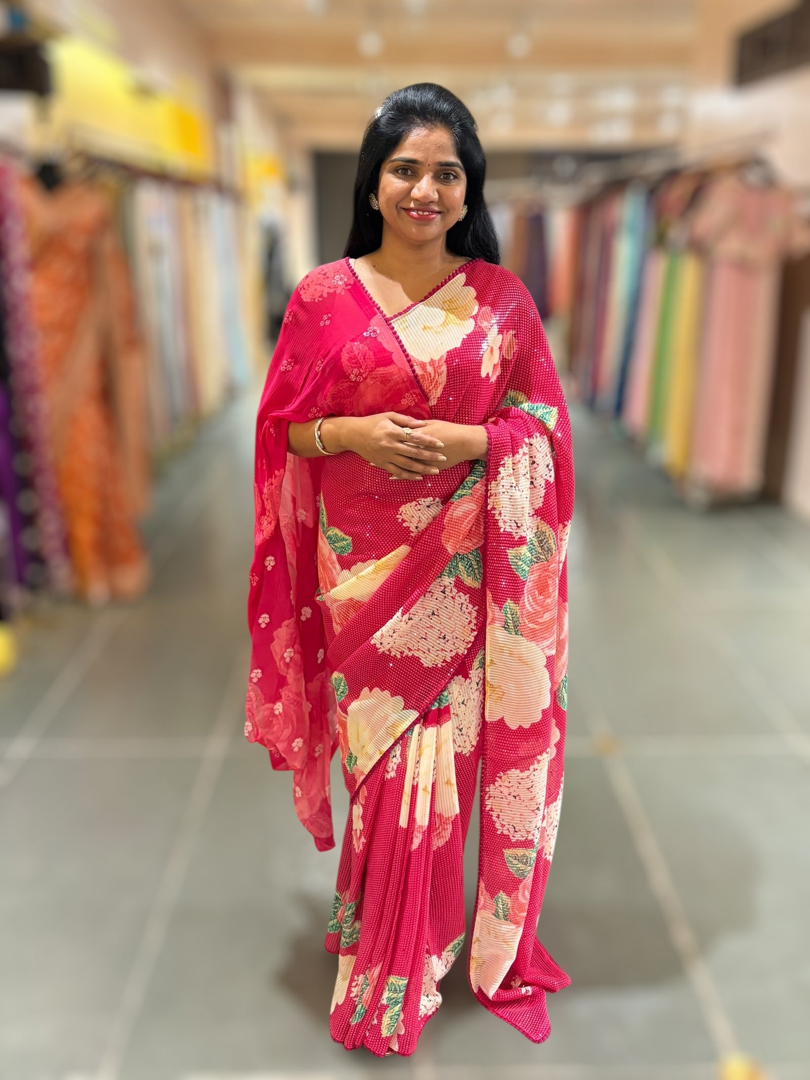 Reddish Pink georgette sequence saree with statement floral print