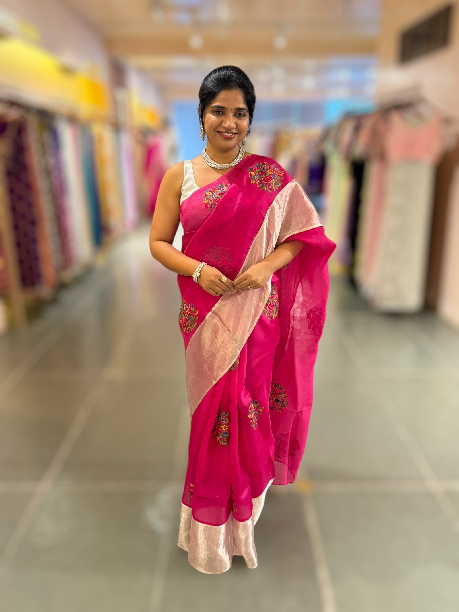 Rani Pink Organza Saree with pure Tissue Border