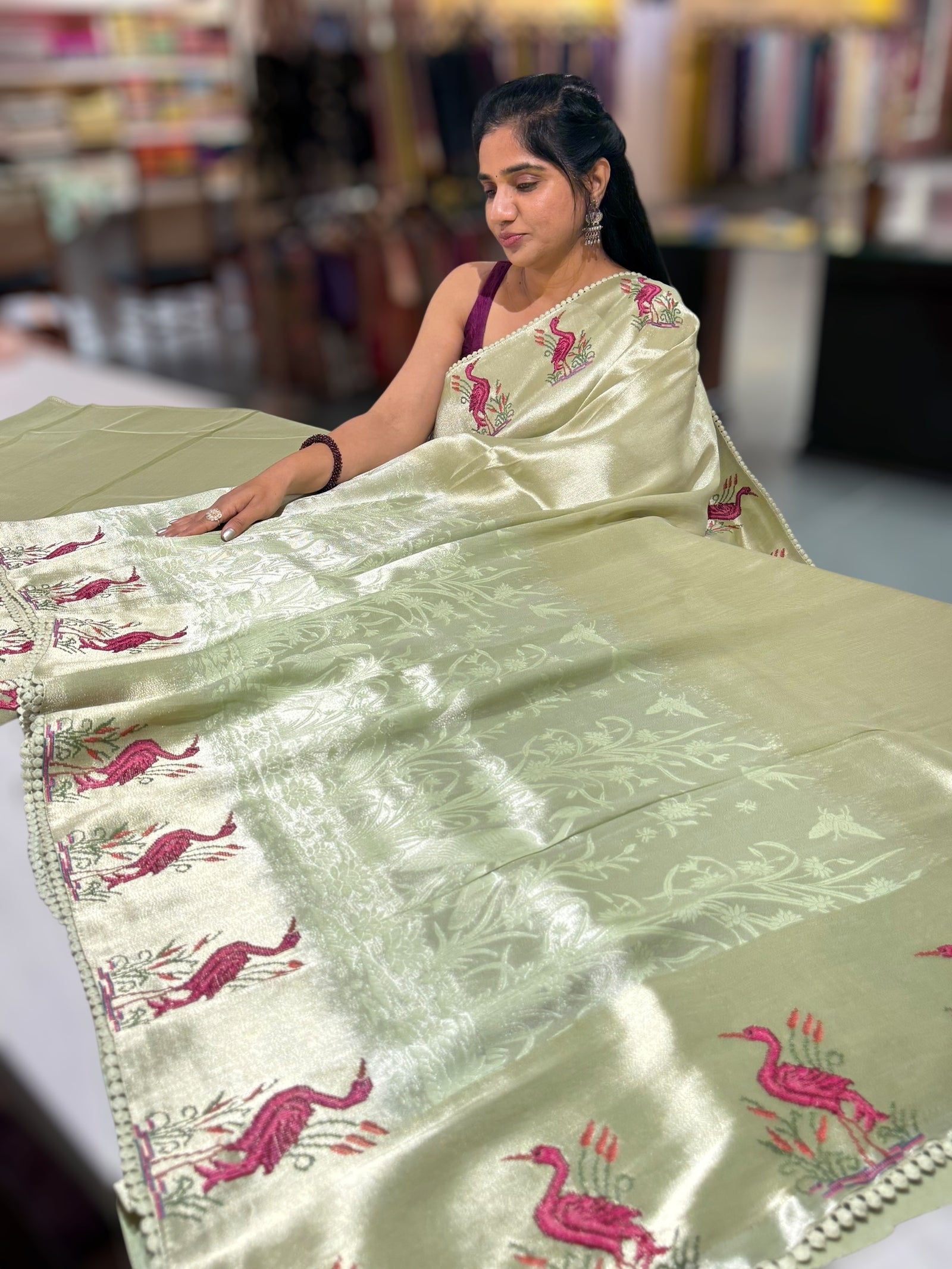 Mint Green Banarasi Brocade tissue saree with tonchui style weaving & petite point embroidered swan border