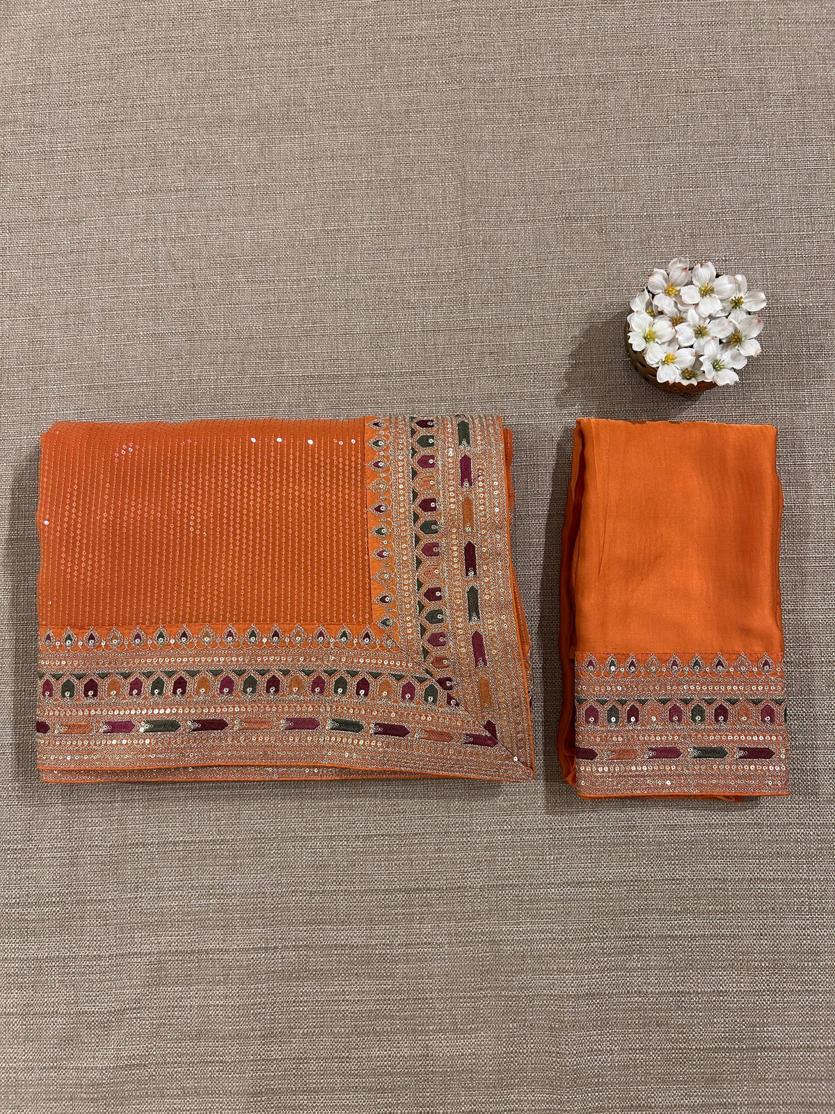 Orange Georgette sequnce Saree with Sabyasachi borders