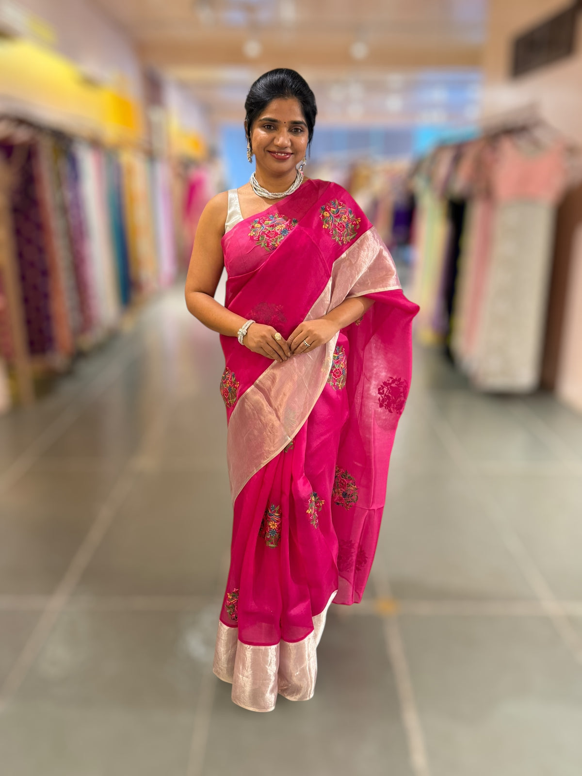 Rani Pink Organza Saree with pure Tissue Border