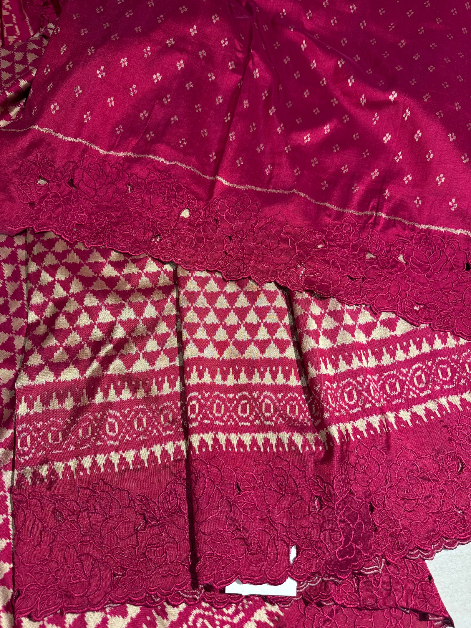 Ruby pink Cambodian–inspired Ikkat Silk Saree with cutwork Rose Border