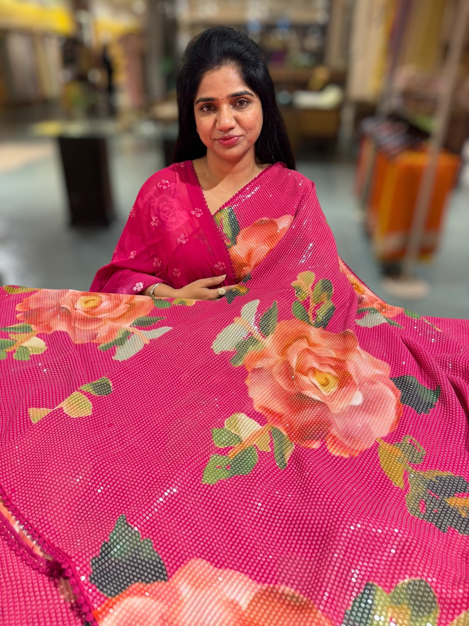 Dark Pink georgette sequence saree with statement floral print