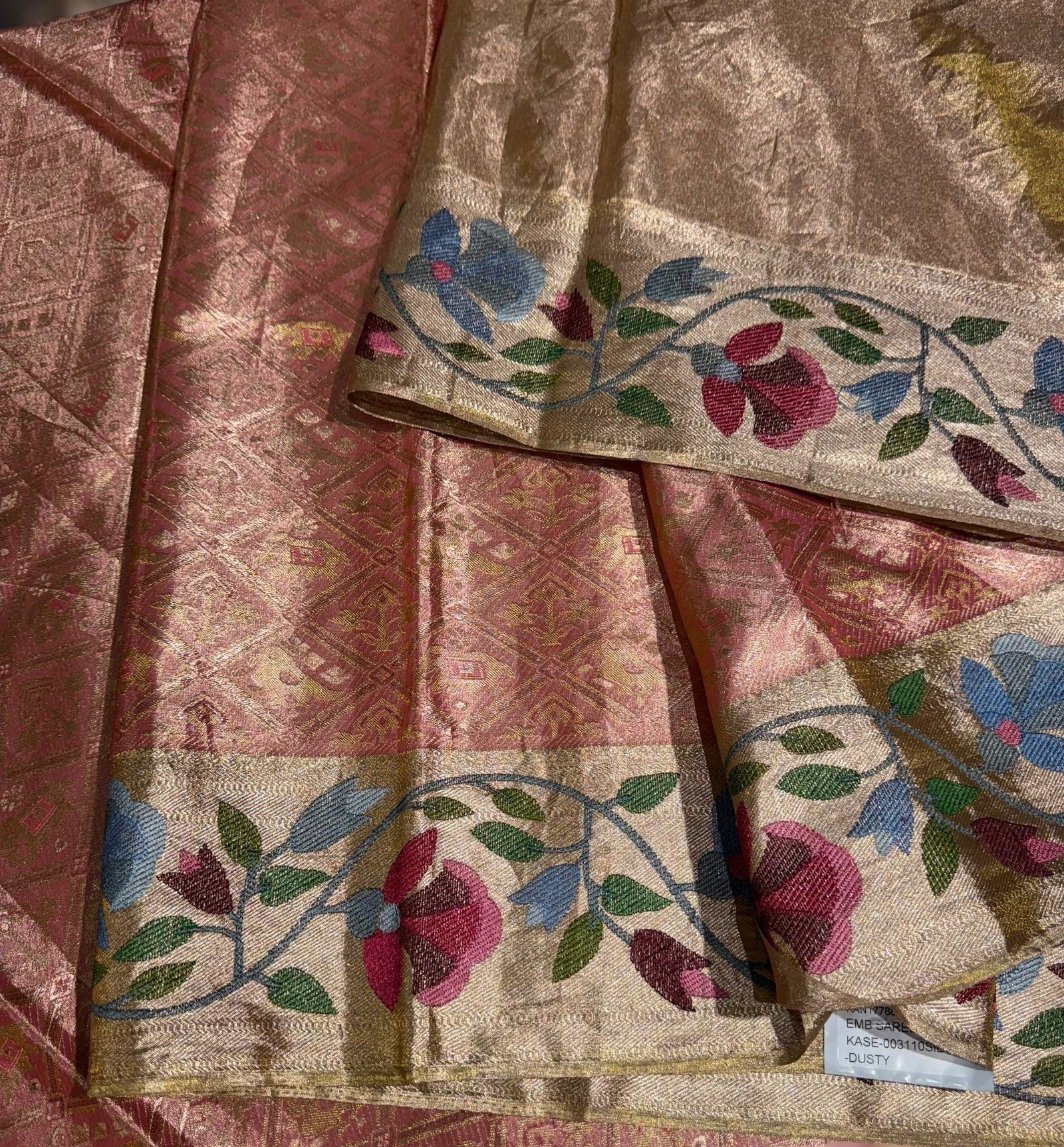 Coral Peach Kanchi Tissue Brocade Saree With jamdani inspired embroidery.