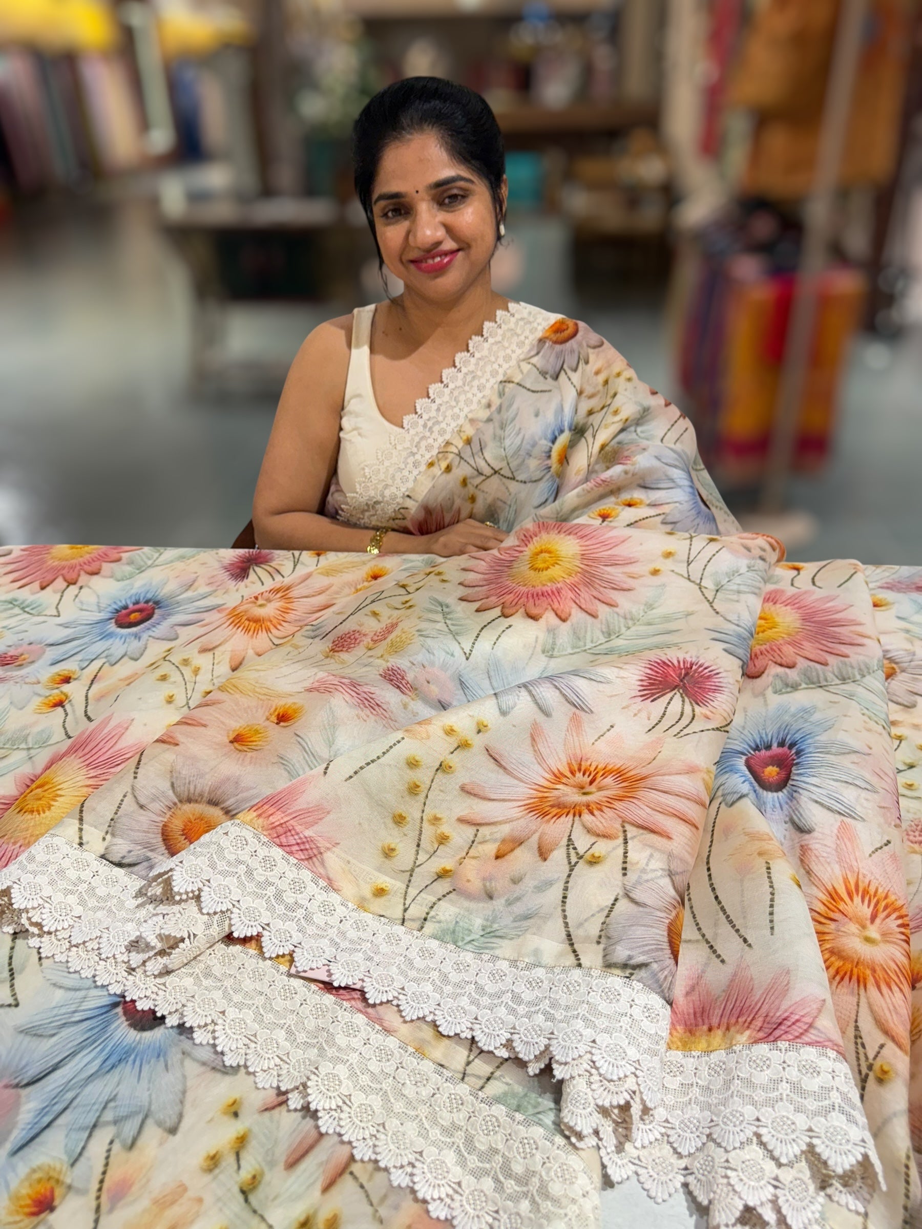 Beige Organza 3D floral Printed Saree hemlined with crotia lace