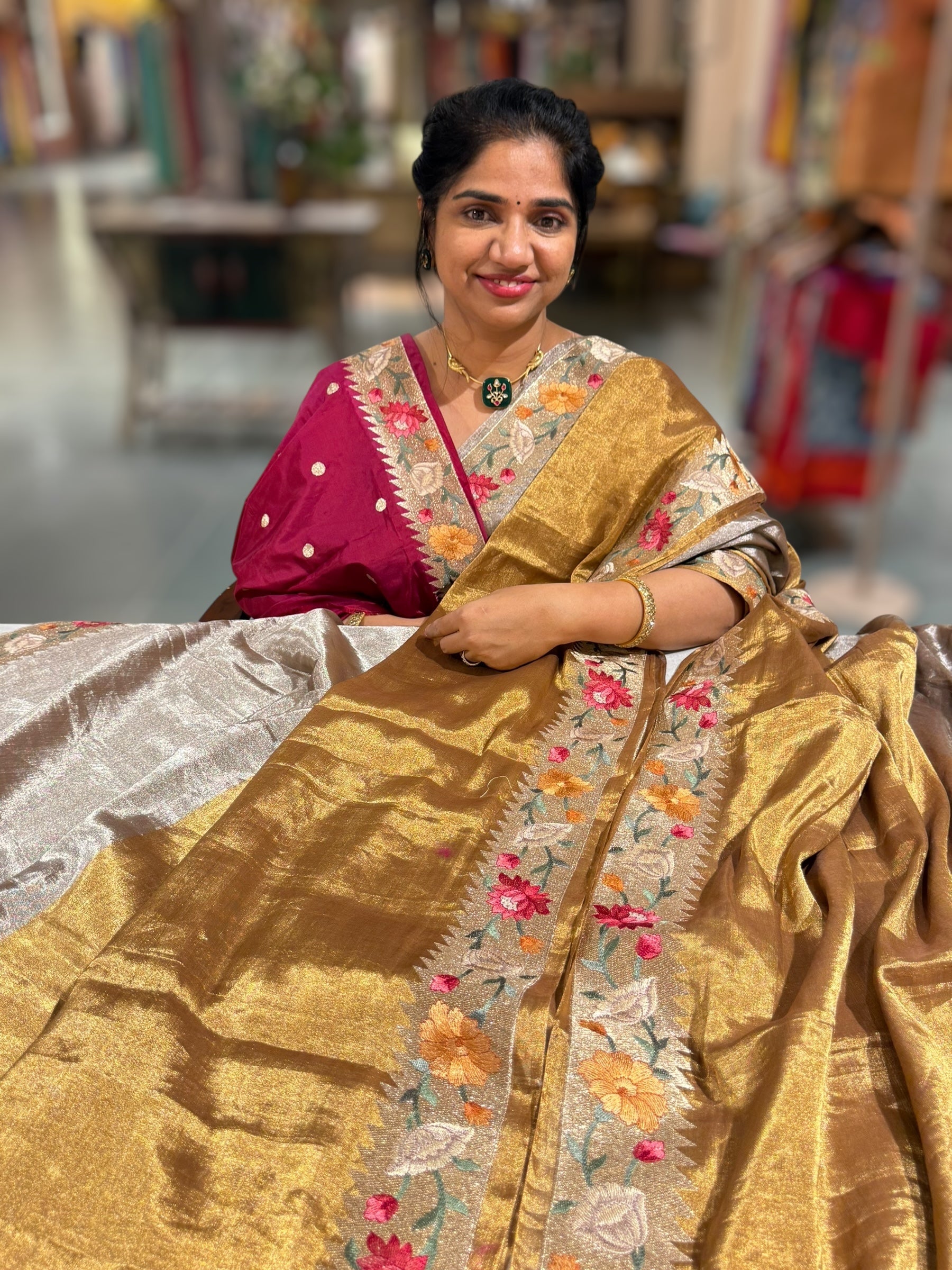 Handloom Tissue Saree with Paithani inspired embroidered border.