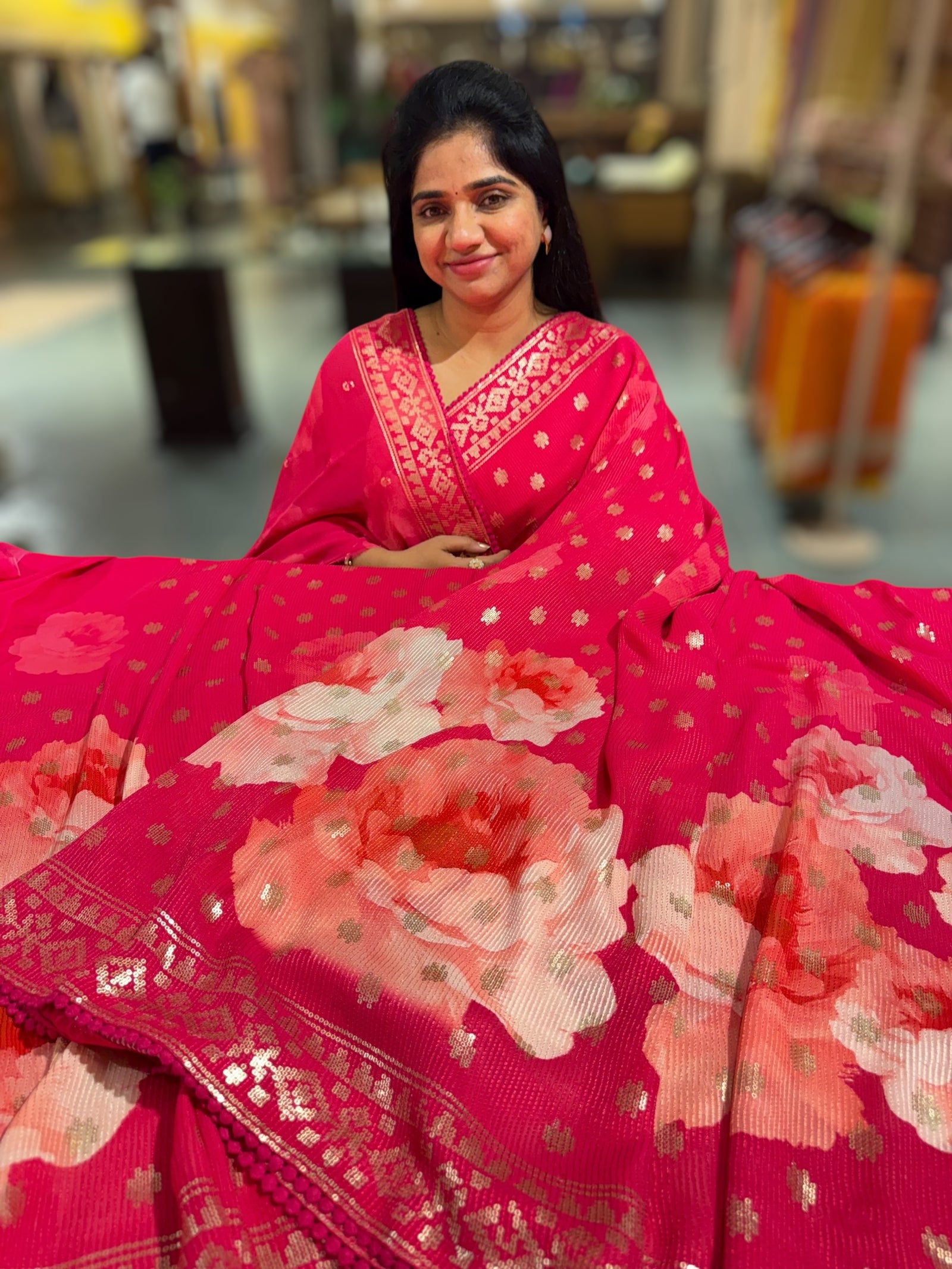 Reddish Pink georgette sequence saree with statement floral print