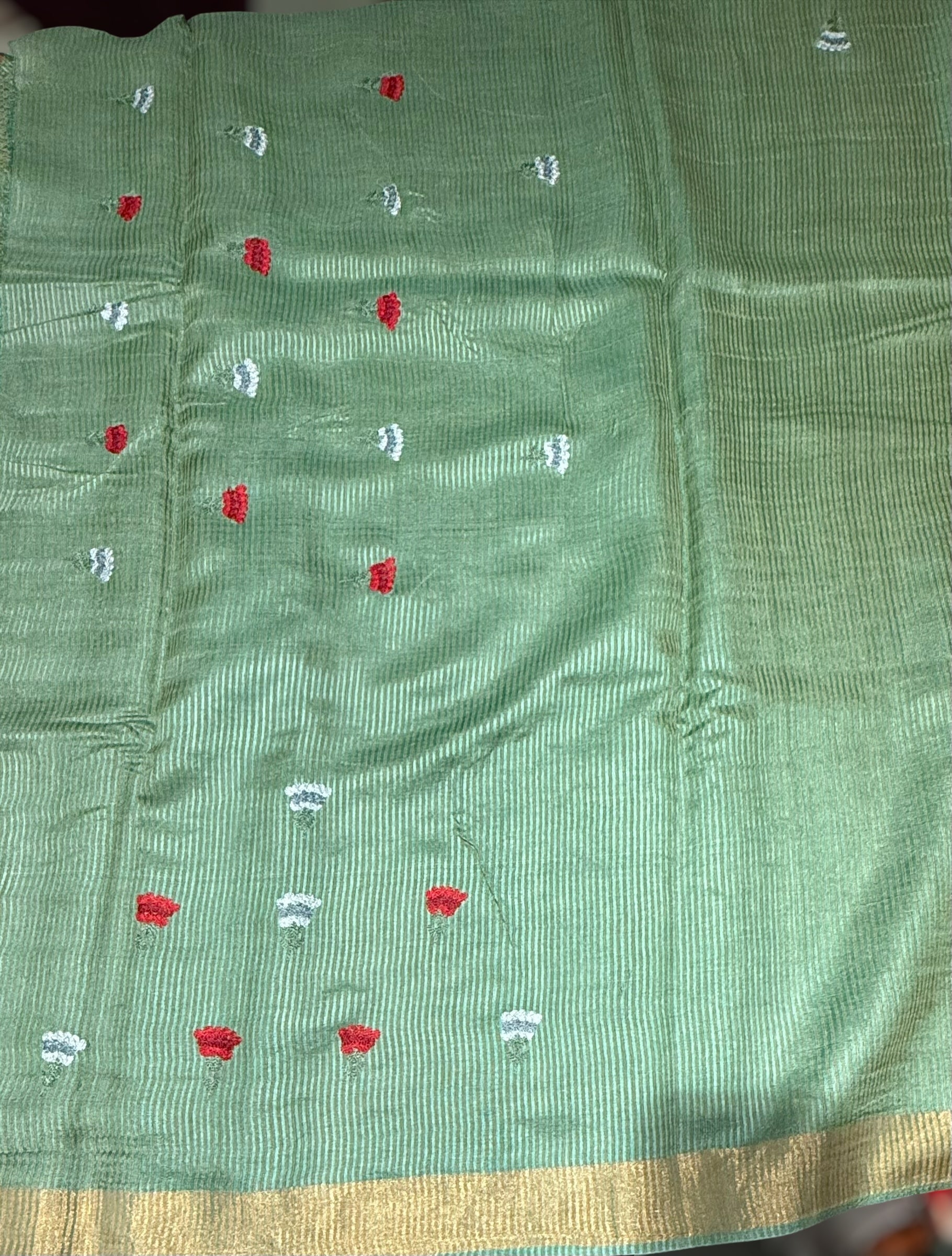 Emerald Green Tussar Brocade Saree With Statement Red Rose Embroidery.