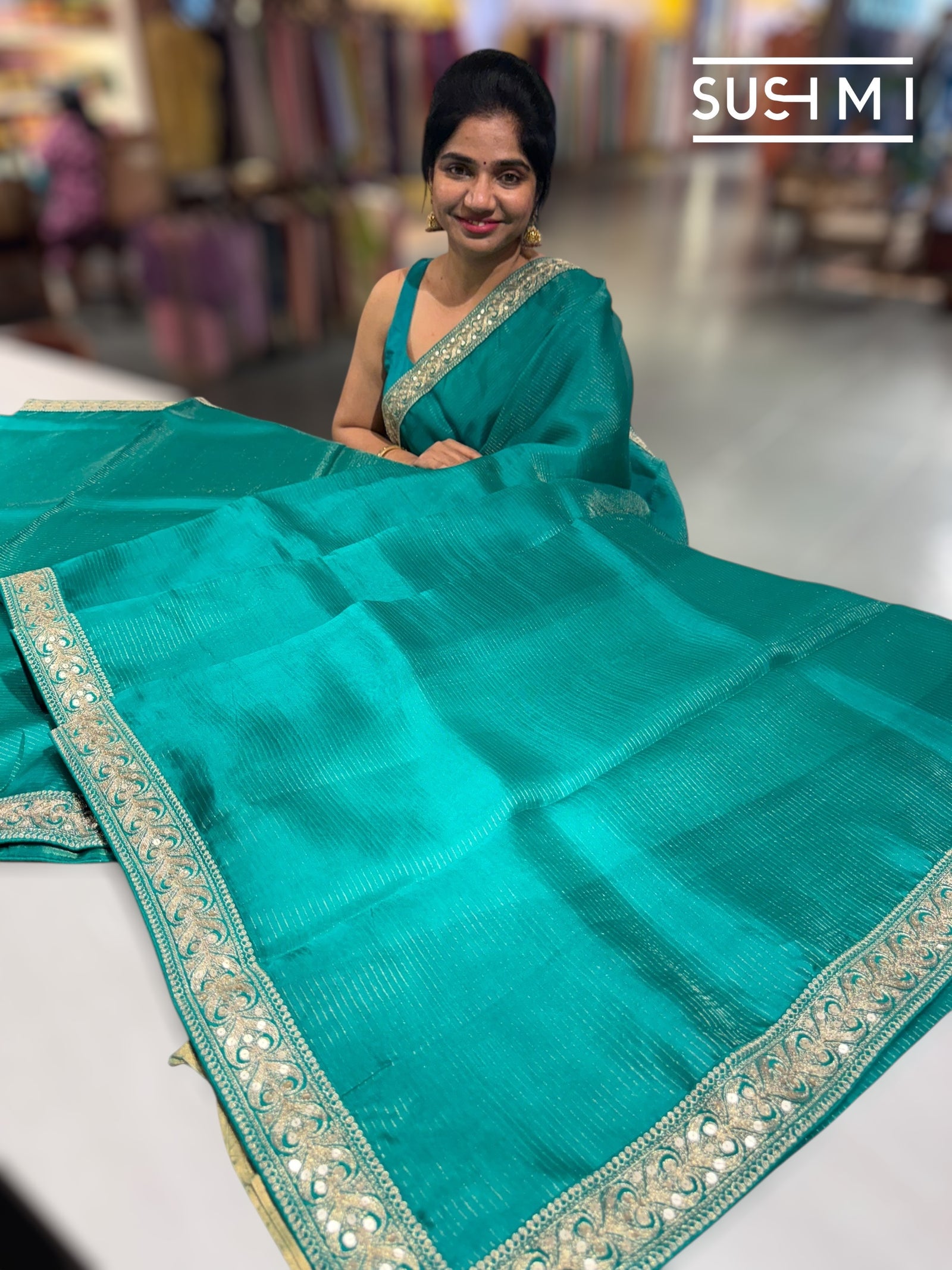 Teal Organza Saree with sabhyasachi borders S62120