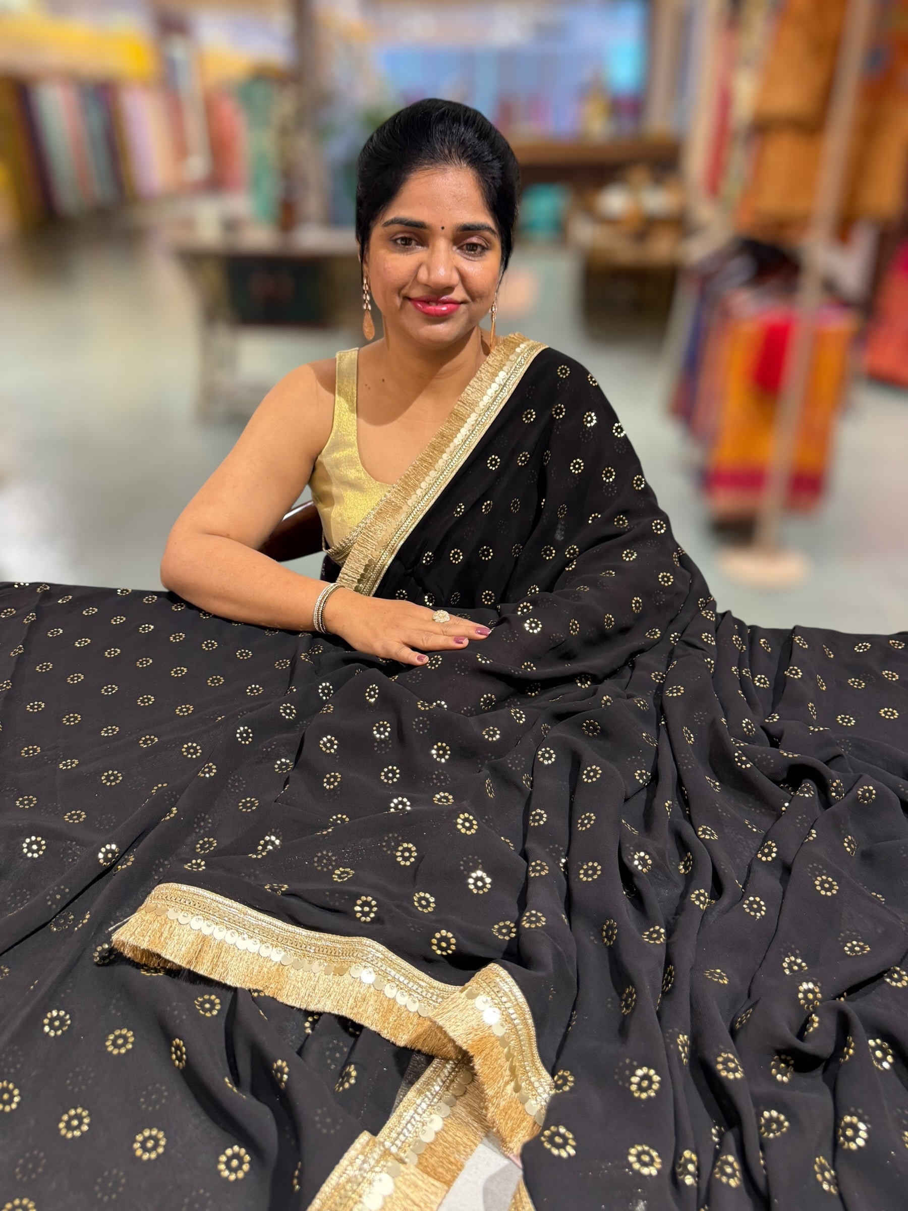 Black Georgette Saree with stick on Badla in flower pattern