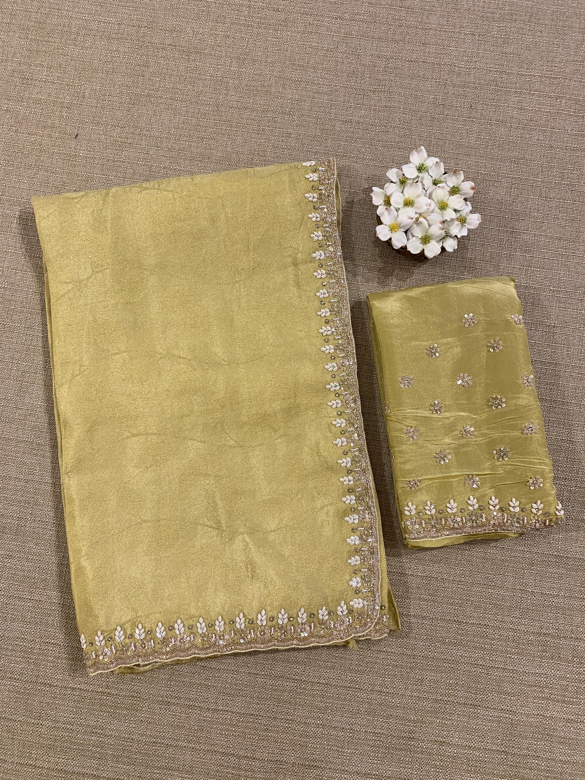Pastel Yellow Tissue Gorgette Saree With Hanwork Border and Blouse.