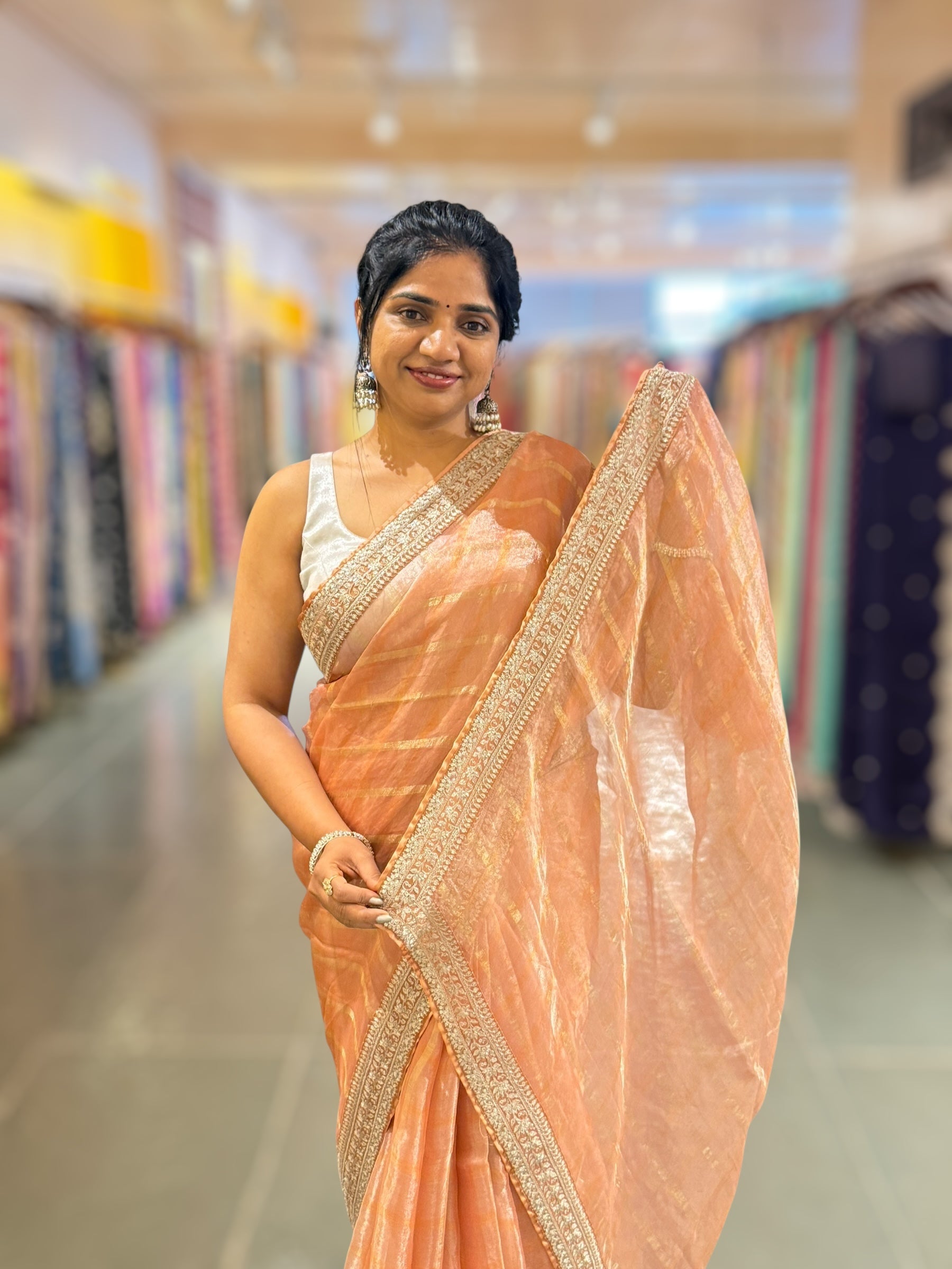 Peach Banarasi Tissue checks Saree with Sabyasachi Borders