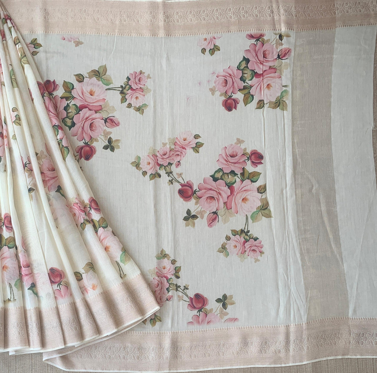 Ivory Pure Handloom Chiniya Silk Saree with stunning Floral Print and zari borders