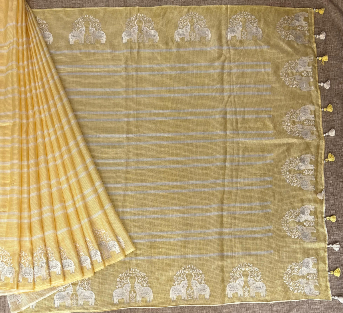 Pastel Yellow Designer Silk kota saree with elephant embroidered border