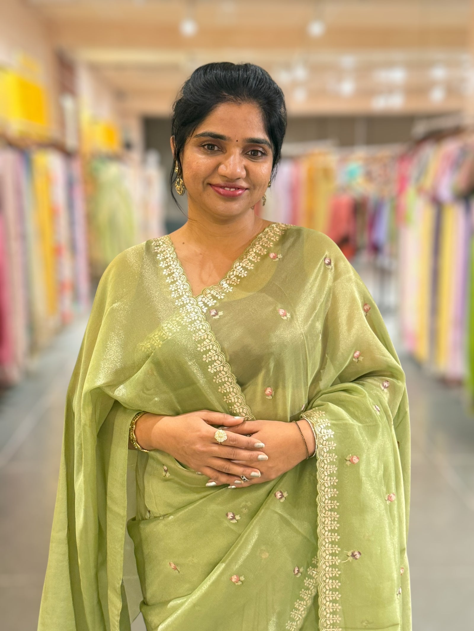 Light Olive Green Tissue Georgette Saree with petite point emb