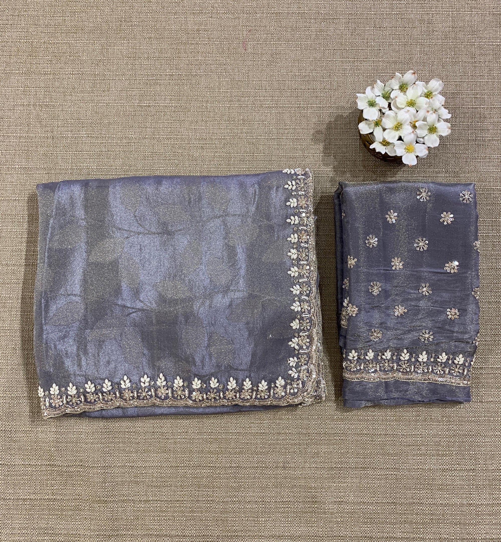 Greyish Violet Tissue Gorgette Saree With Hanwork Border and Blouse.