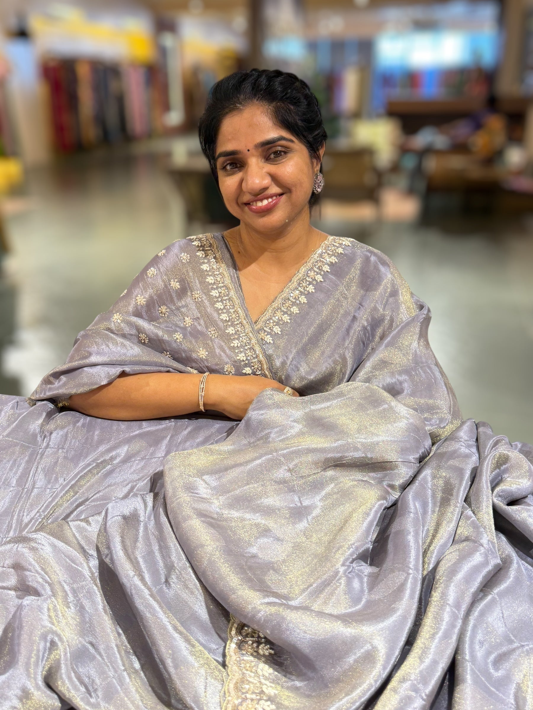 Greyish Violet Tissue Gorgette Saree With Hanwork Border and Blouse.