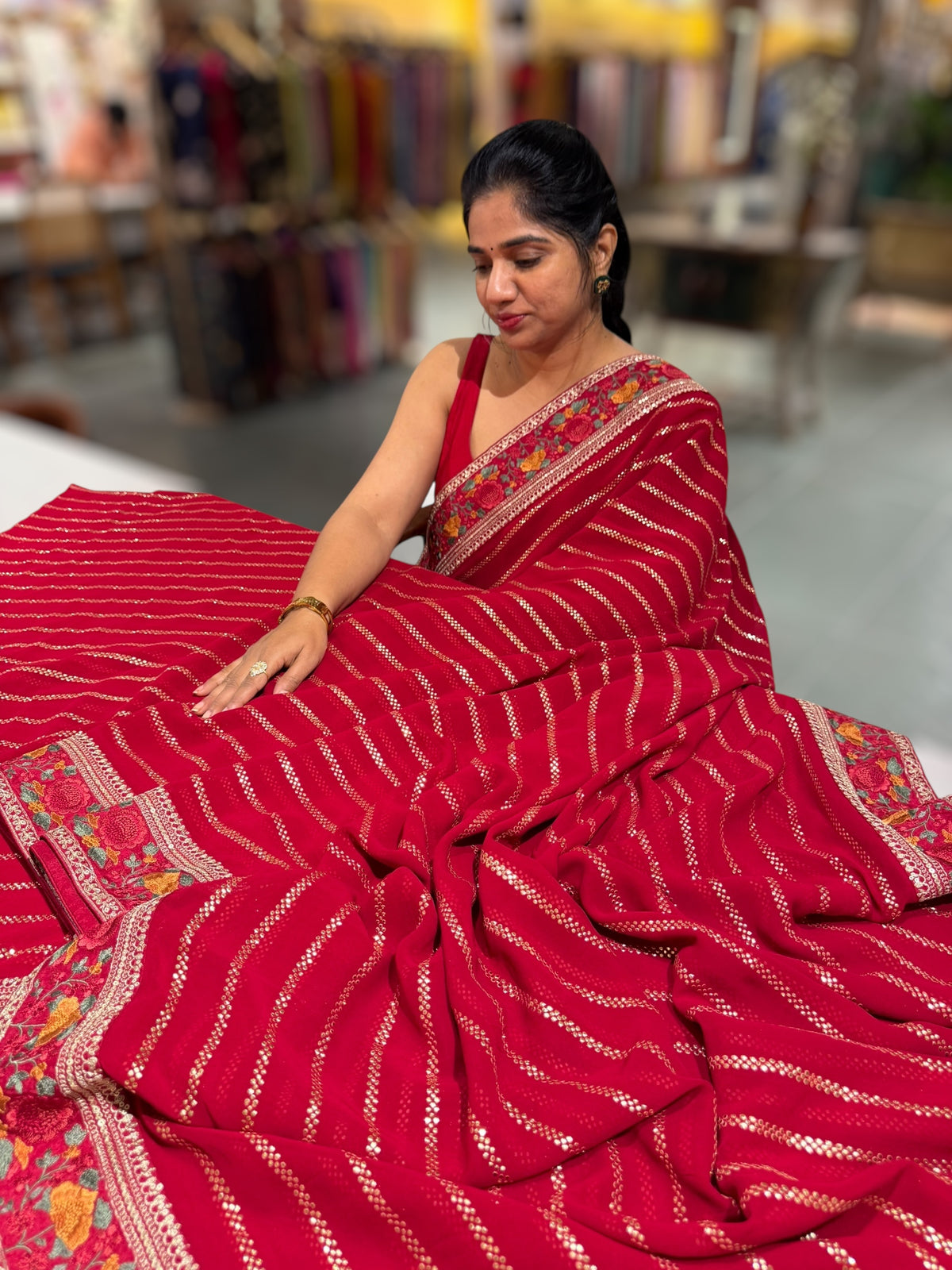 Red Georgette Saree with stick on badla with Sabyasachi borders and blouse