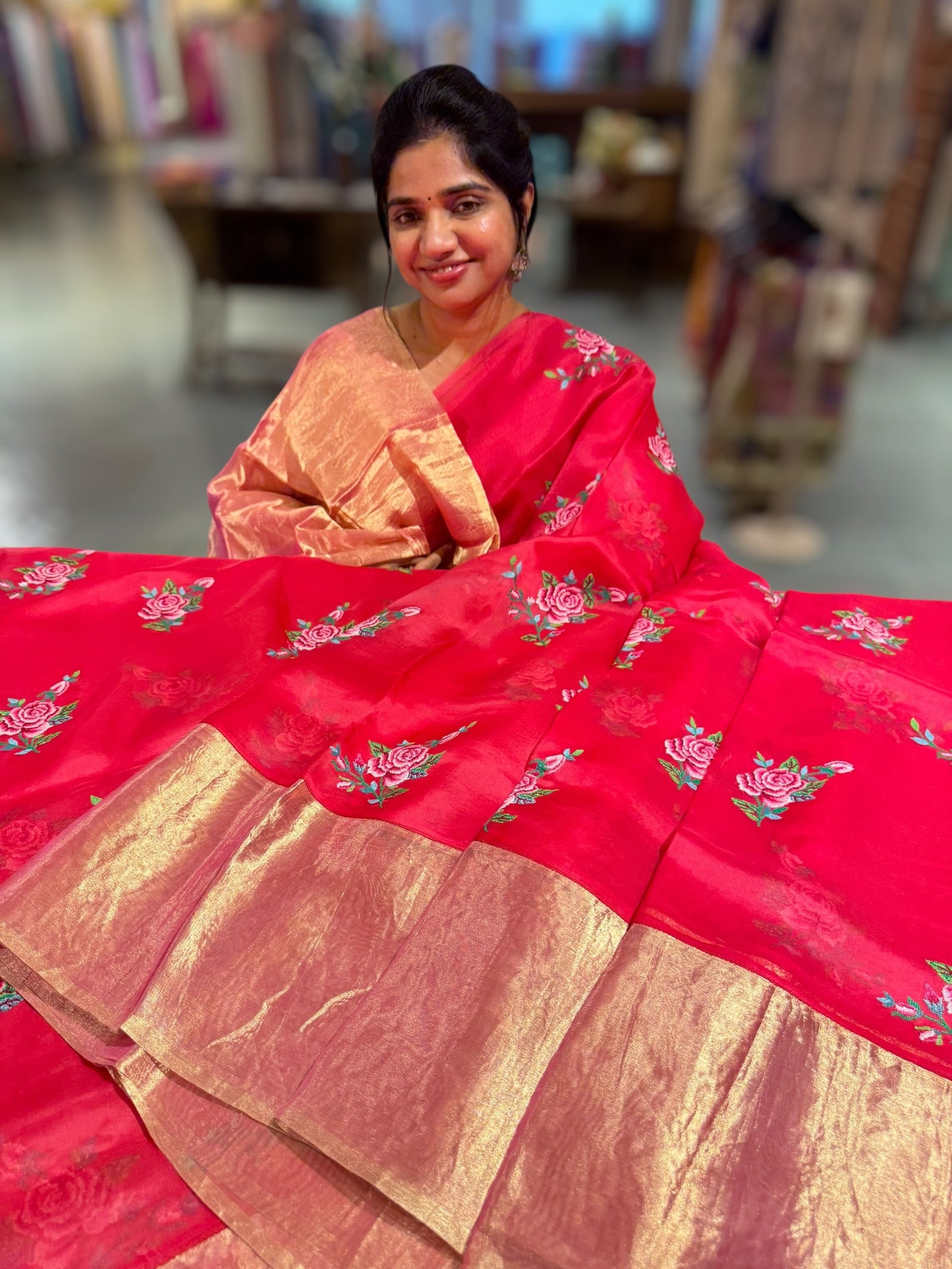 Pinkish Red Organza Saree with pure Tissue Border