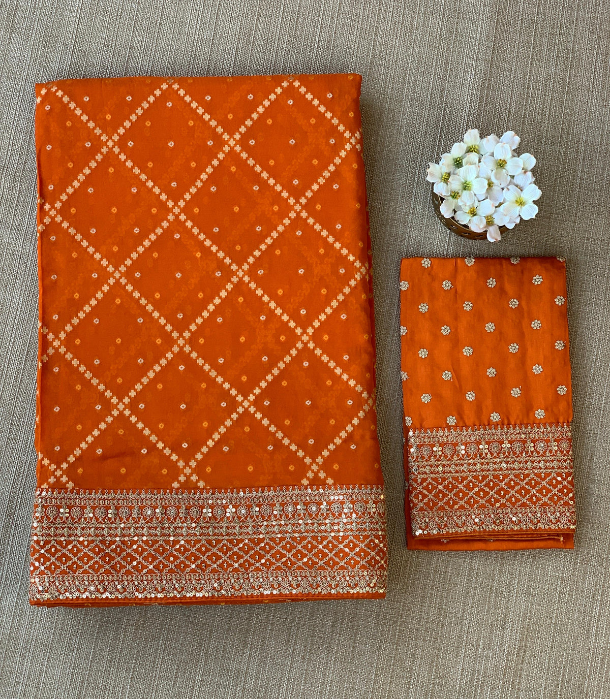 Orange Fancy Banarasi Bandhini georgette saree with sabhyasachi borders and blouse