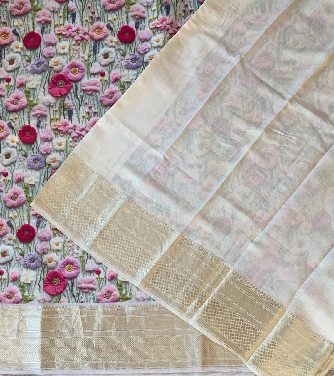 Ivory Pure Handloom Chiniya Silk Saree with stunning Floral Print and zari borders