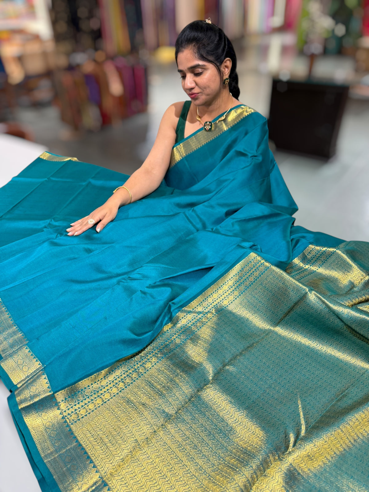 Peacock Green vintage Kanchipuram silk saree with pen kalamkari blouse